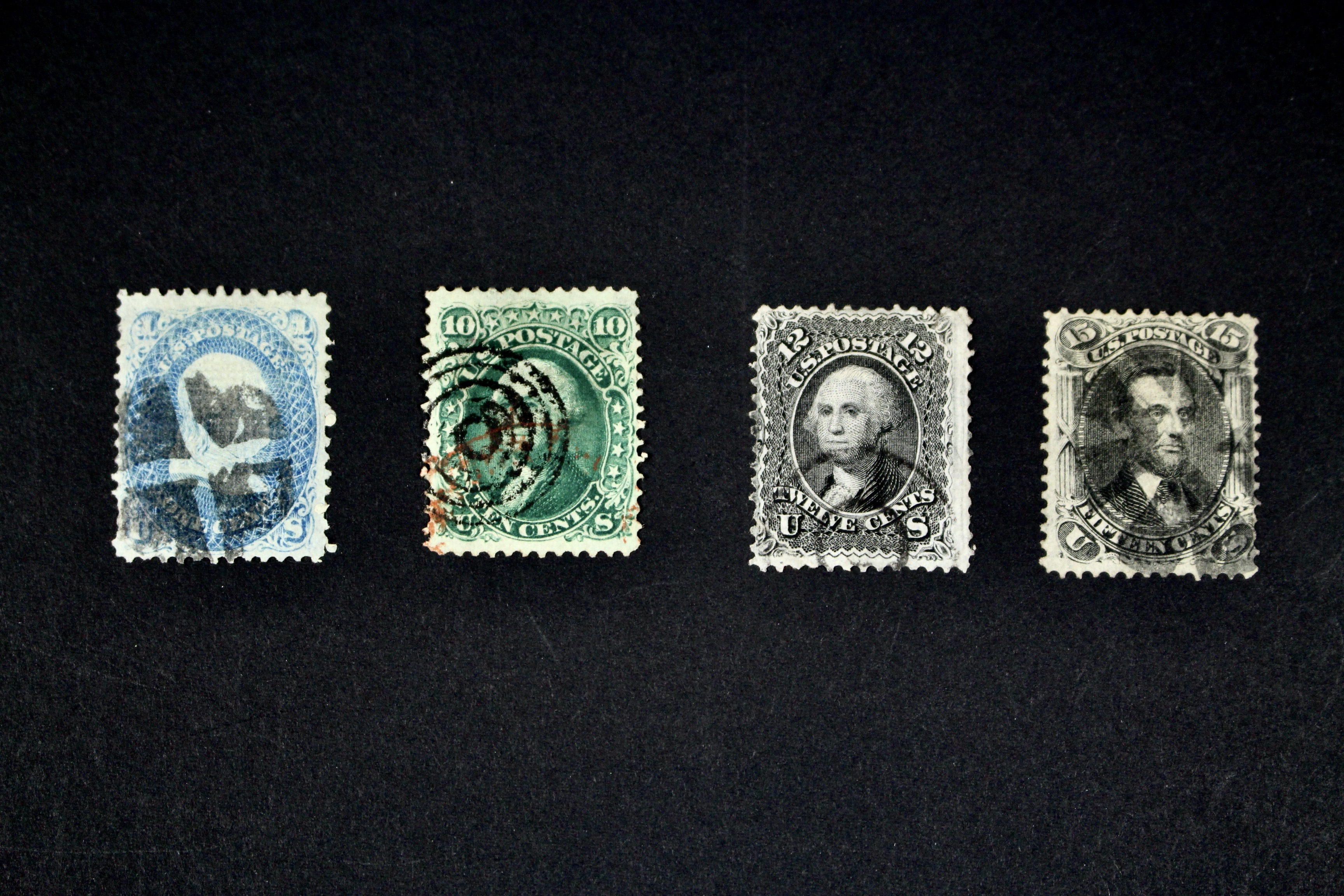 Four 1867 U.S. Postage Stamps with F Grill