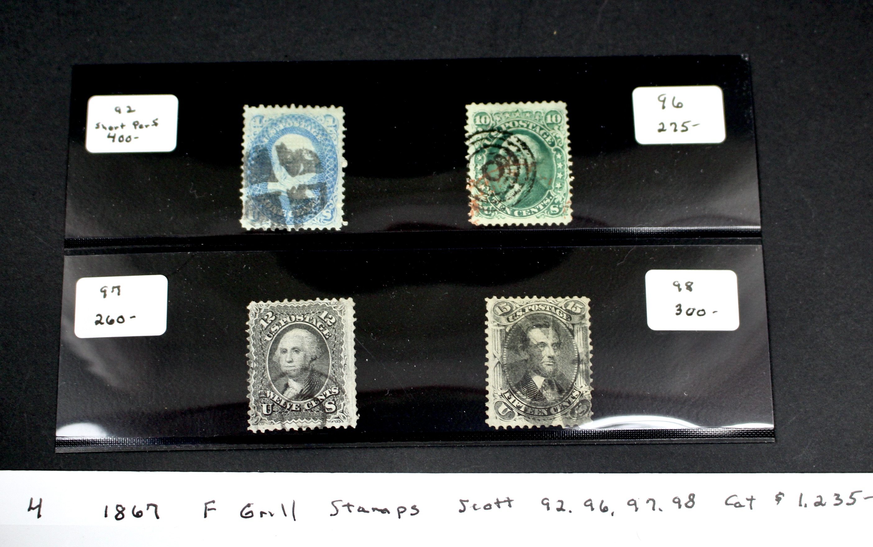 Four 1867 U.S. Postage Stamps with F Grill