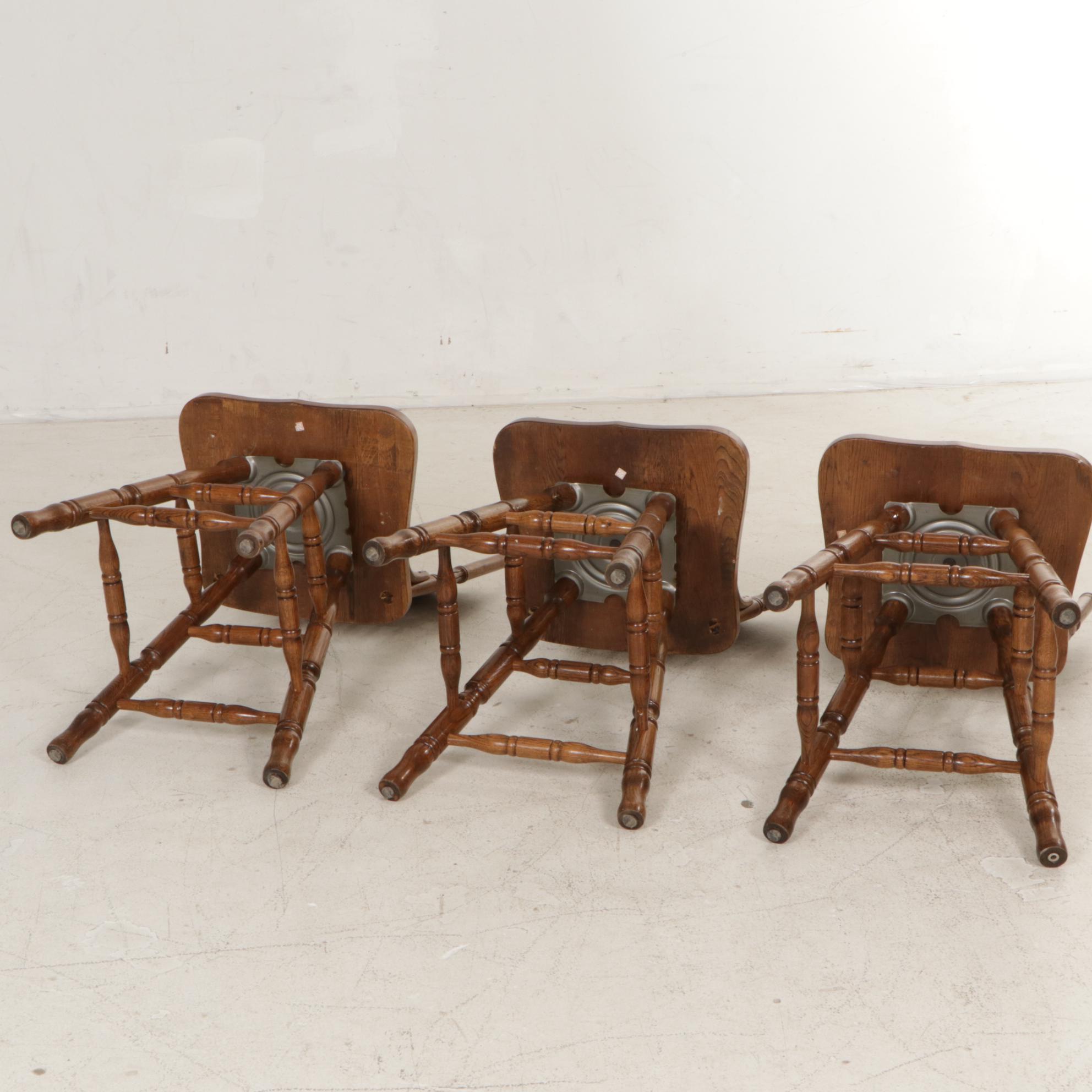 Three Victorian Style Oak Press-Back Swivel Barstools
