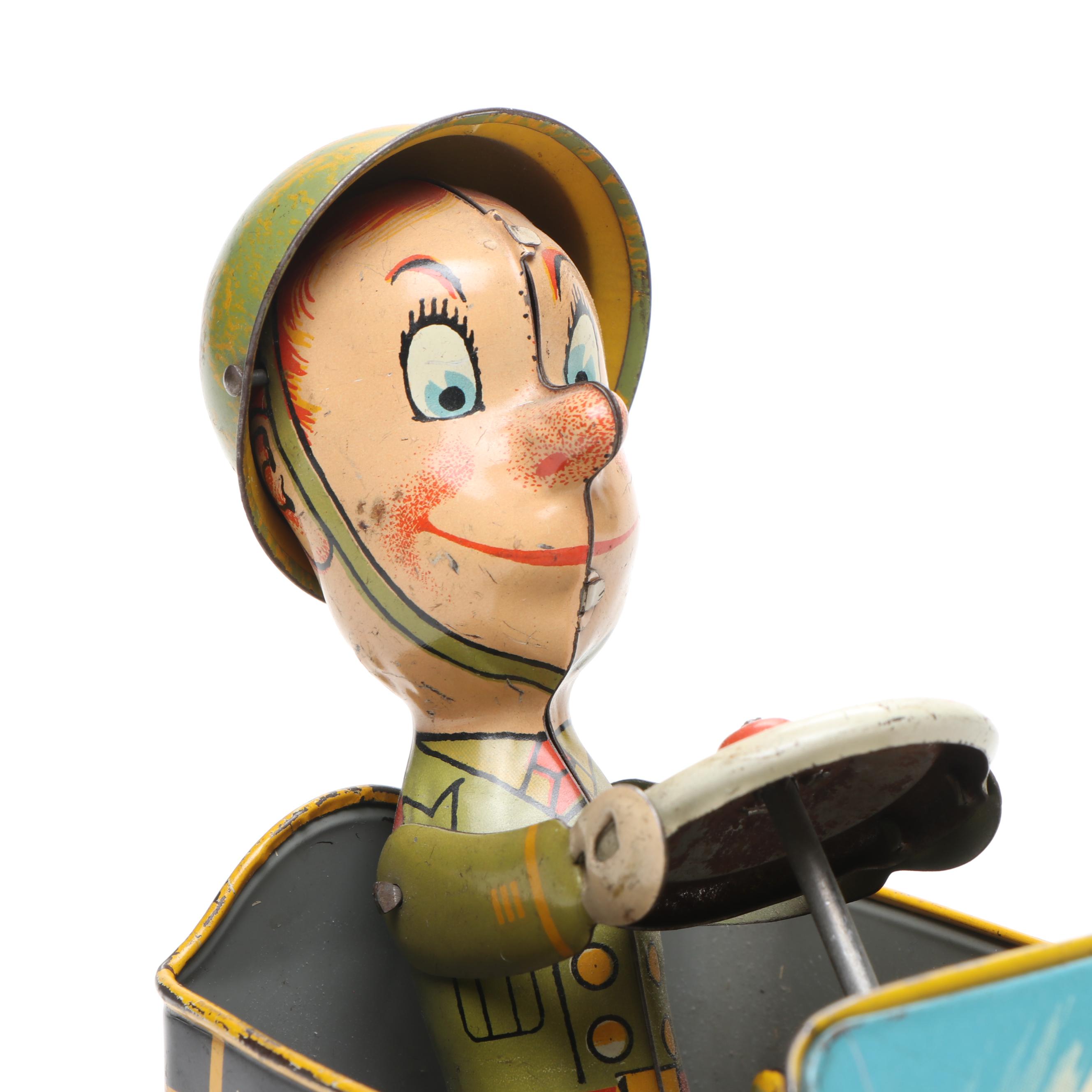 Unique Art "G.I. Joe and His Jouncing Jeep" Wind-Up Toy, Mid-20th Century