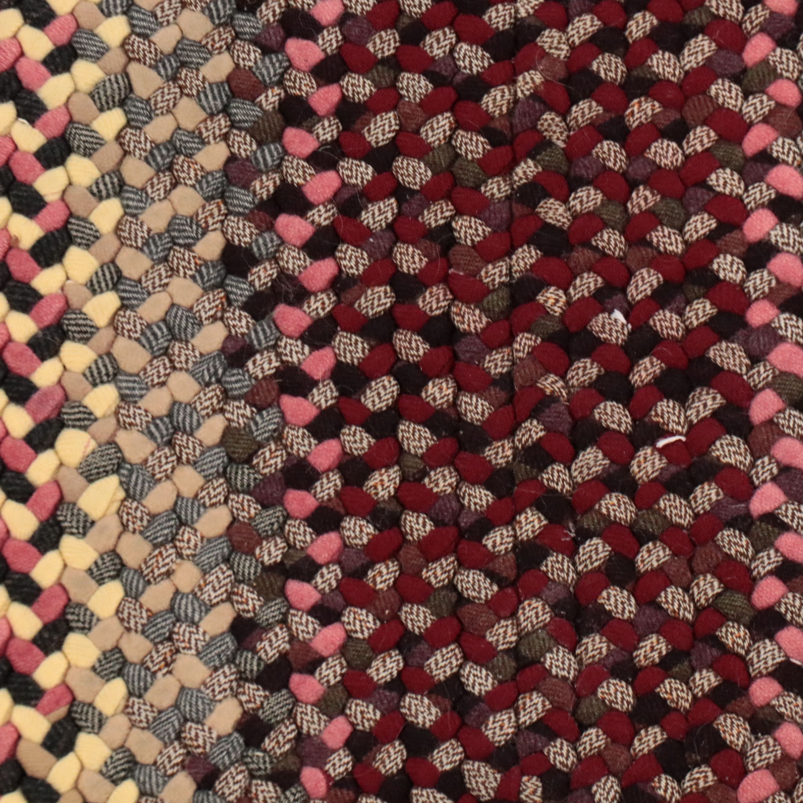 Two Oval Handmade Braided Accent Rugs