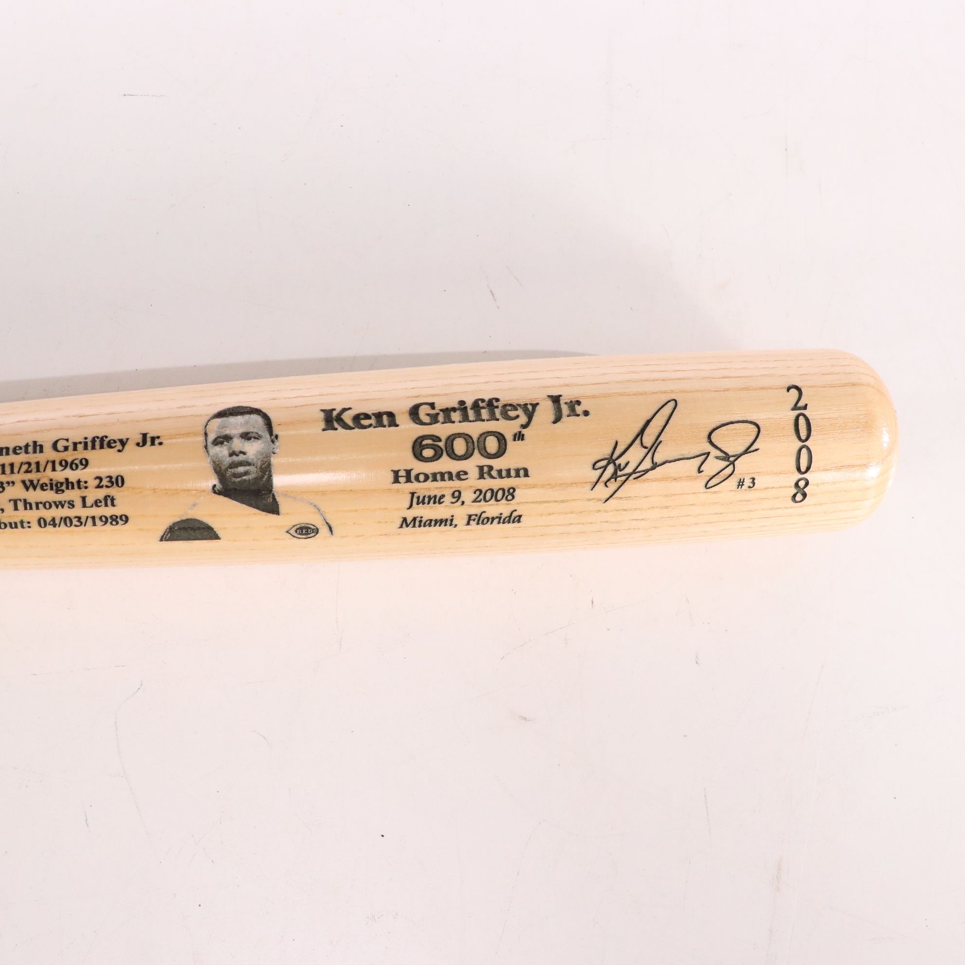 Ken Griffey Jr. Baseball Bat and Framed Cincinnati Reds Items