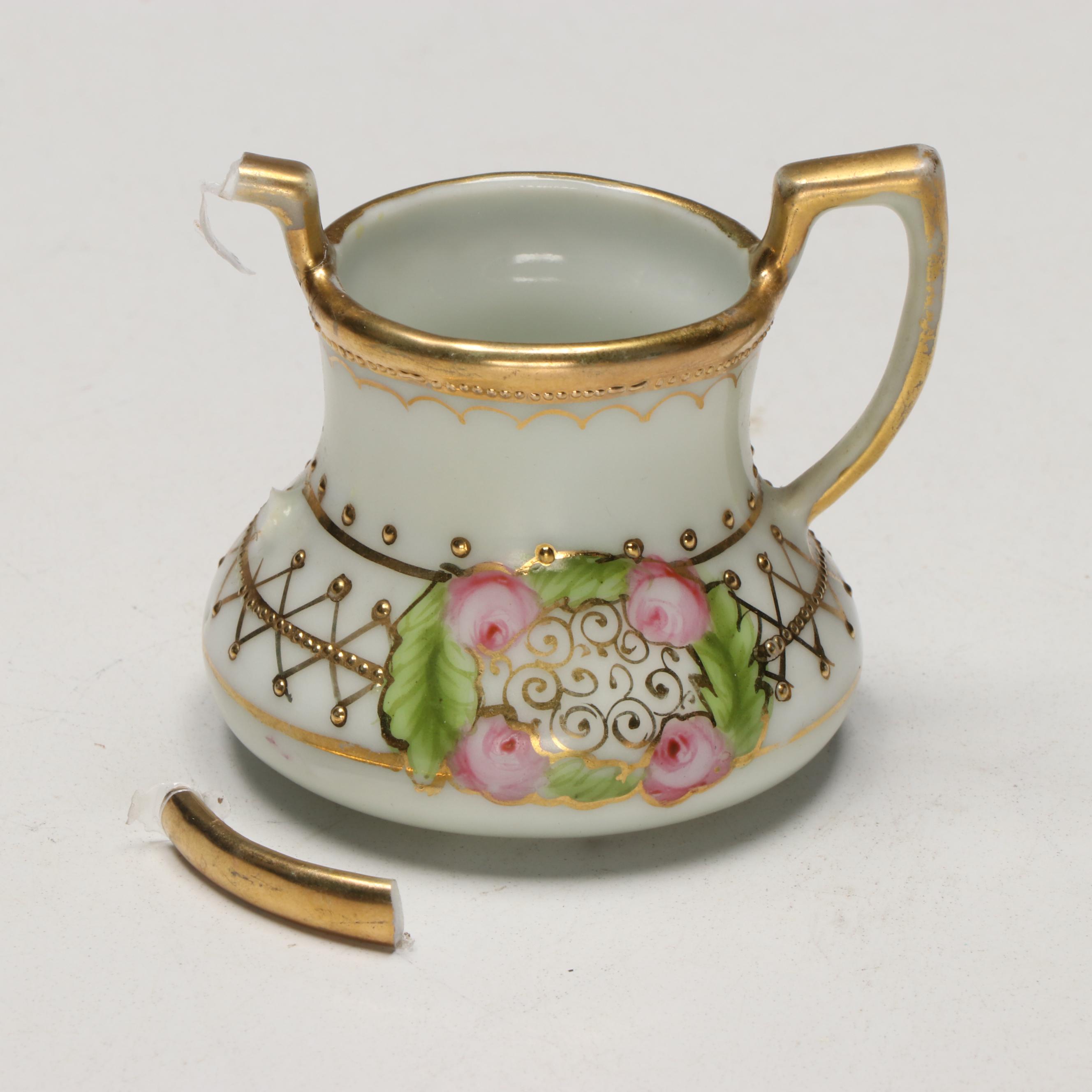 Nippon Japanese Porcelain Gilt and Floral Sugar Bowl and Table Accessories