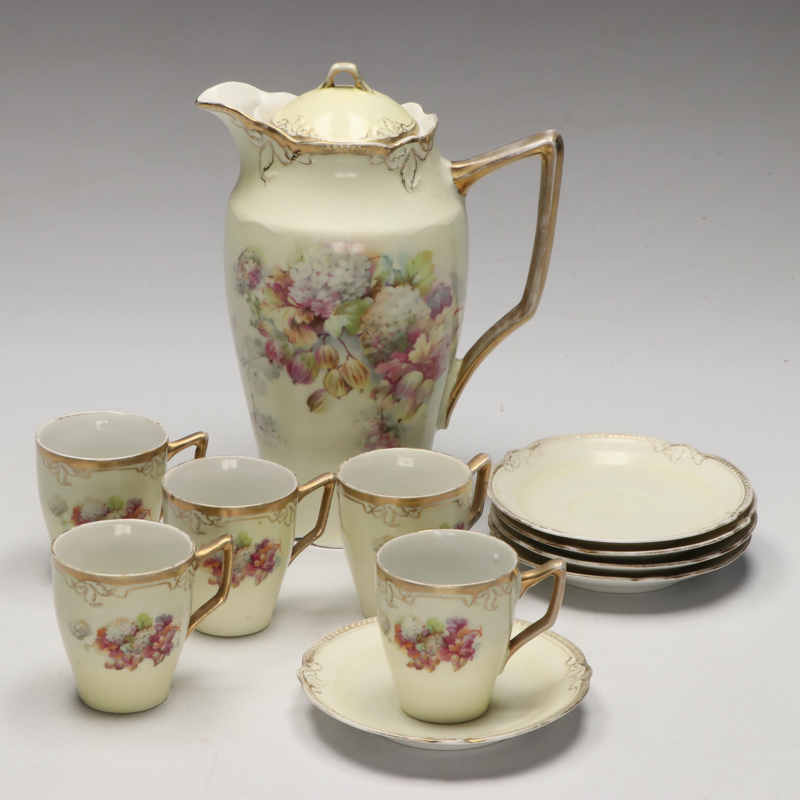 German Gilt Accented Floral Pattern Porcelain Coffee Set, Early to Mid-20th C.