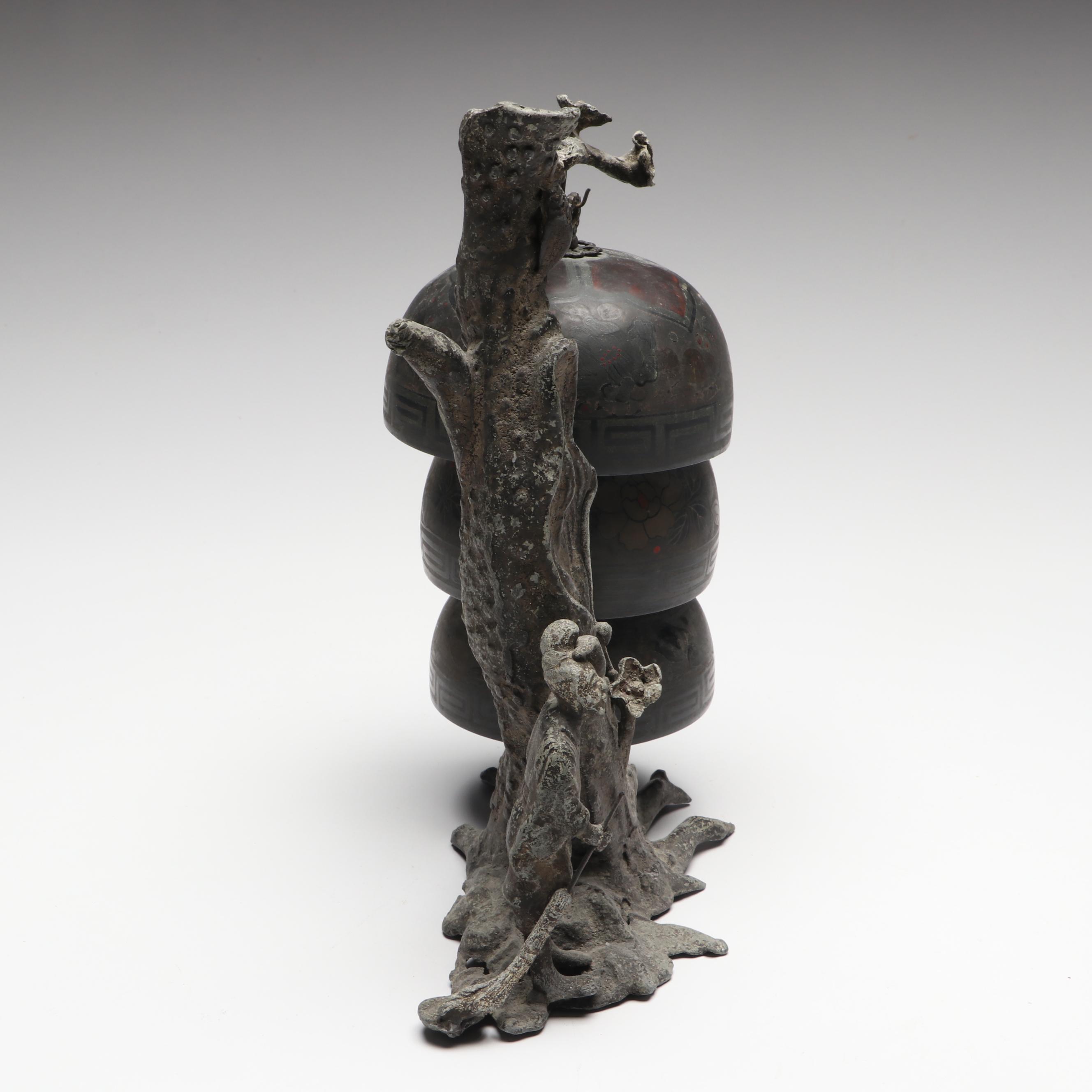 Chinese Style Triple Tiered Bell Attached to Tree and Sweeping Man