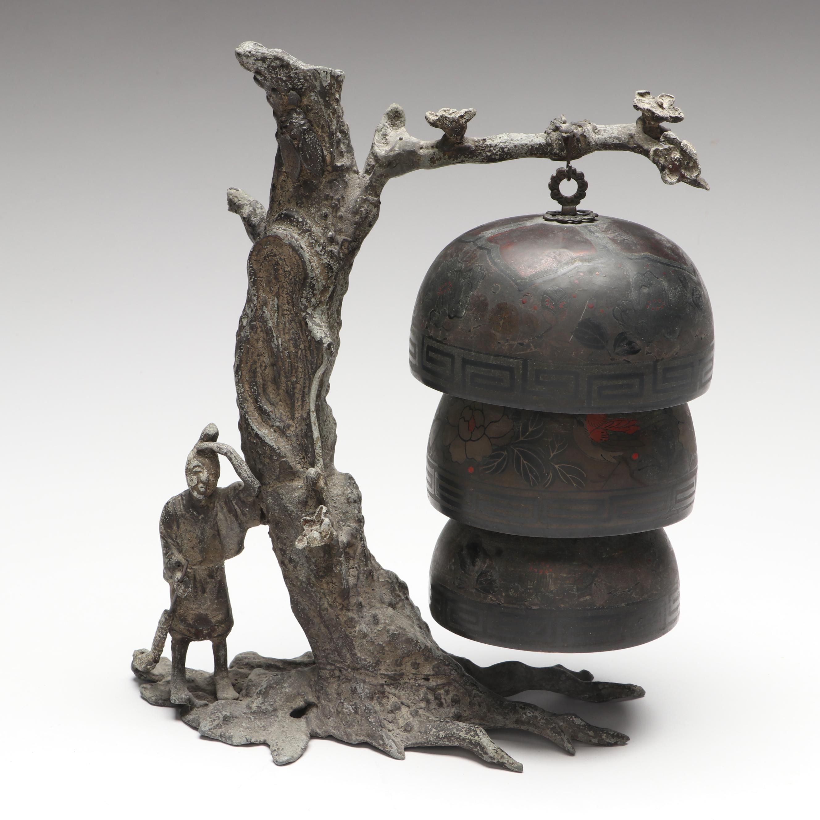 Chinese Style Triple Tiered Bell Attached to Tree and Sweeping Man