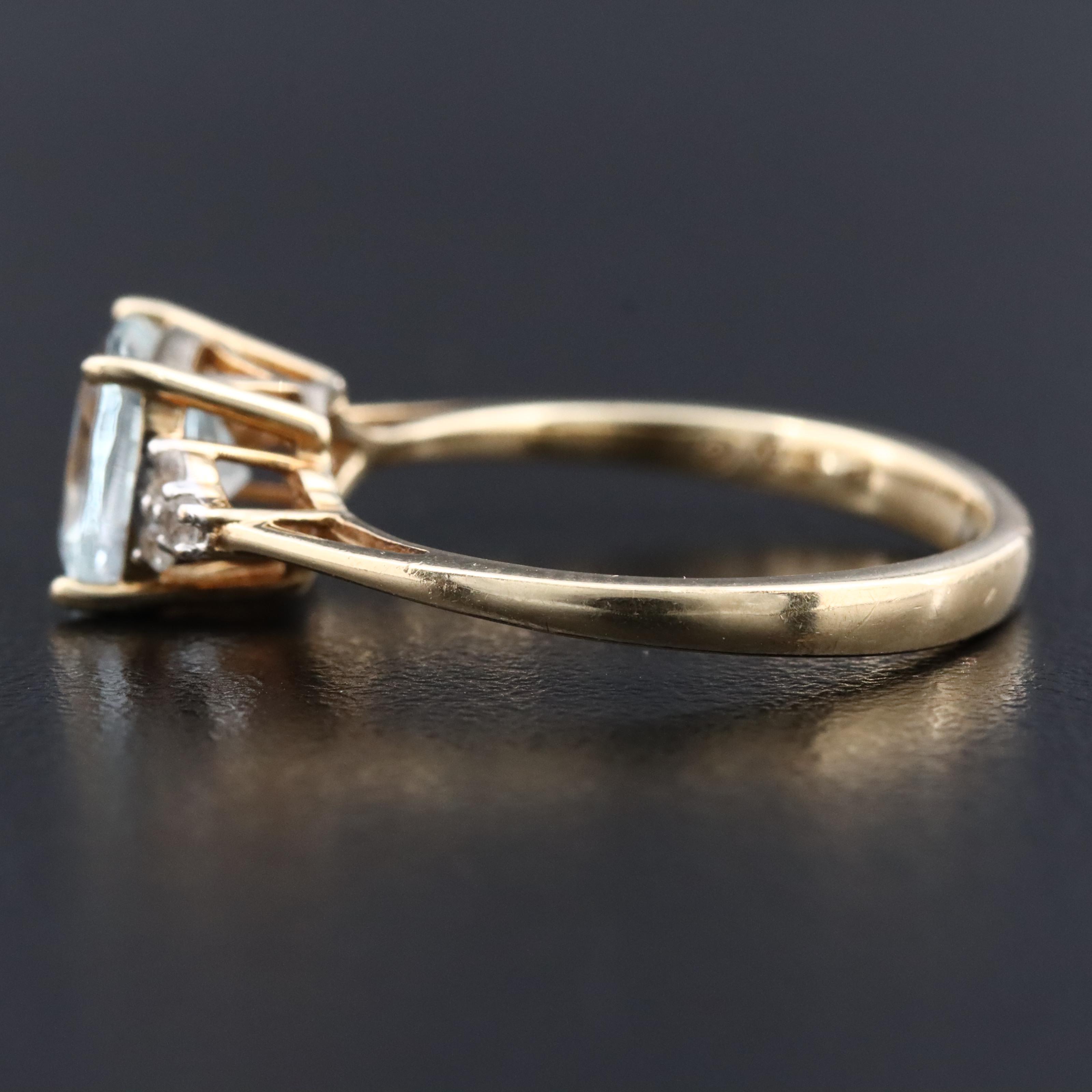 10K Aquamarine and White Sapphire Ring