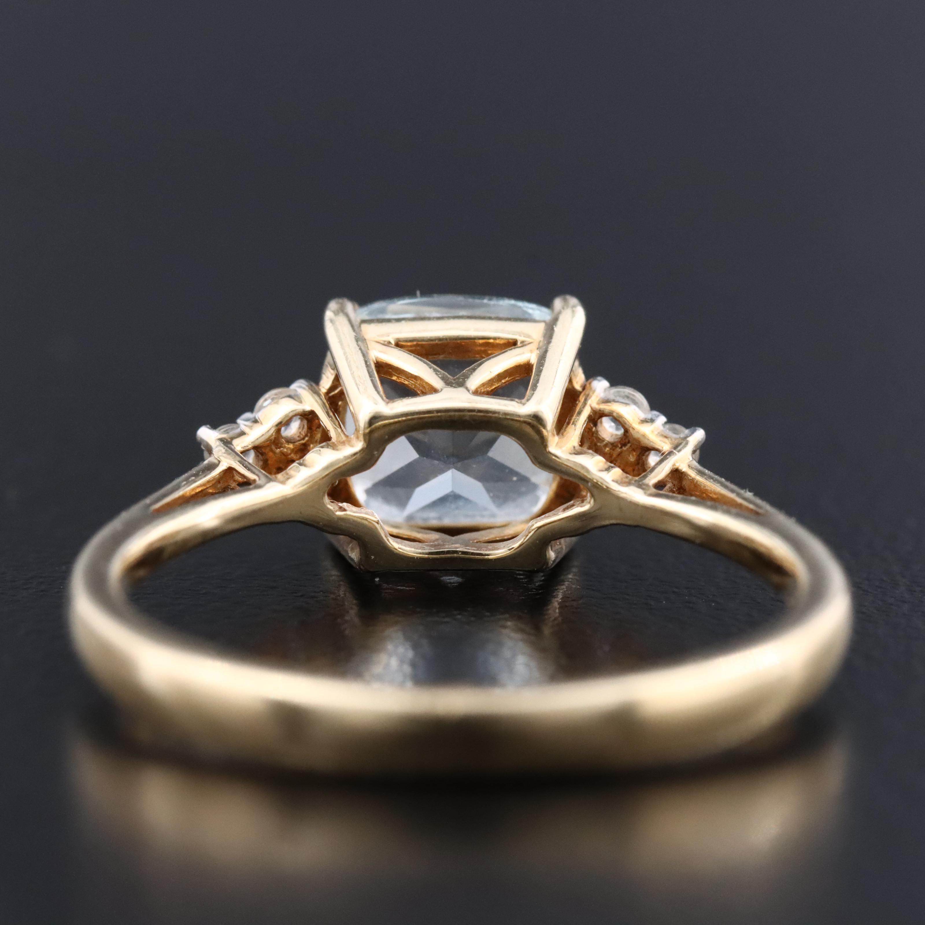 10K Aquamarine and White Sapphire Ring