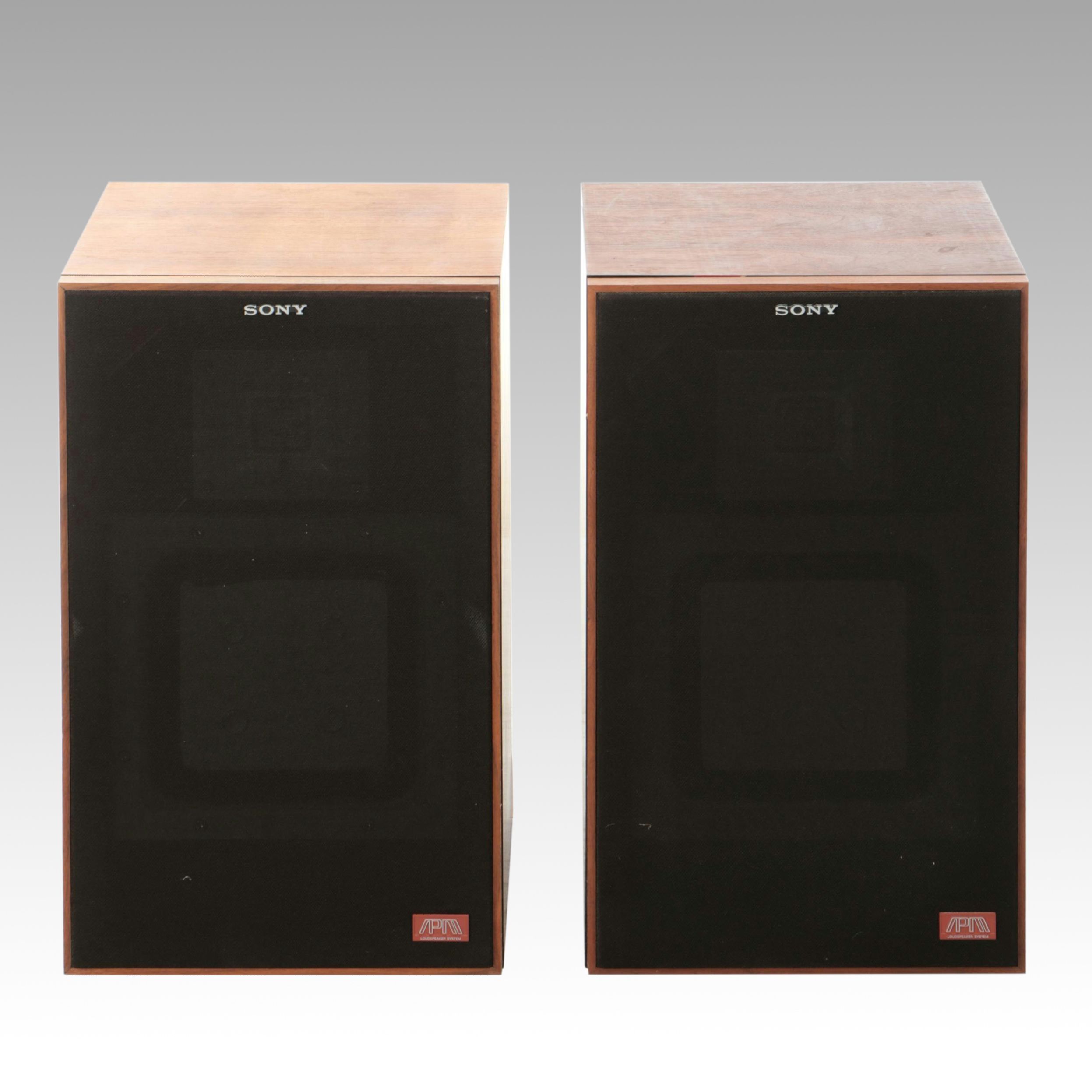 Pair of Sony APM Loudspeakers with Walnut Veneer Cabinets