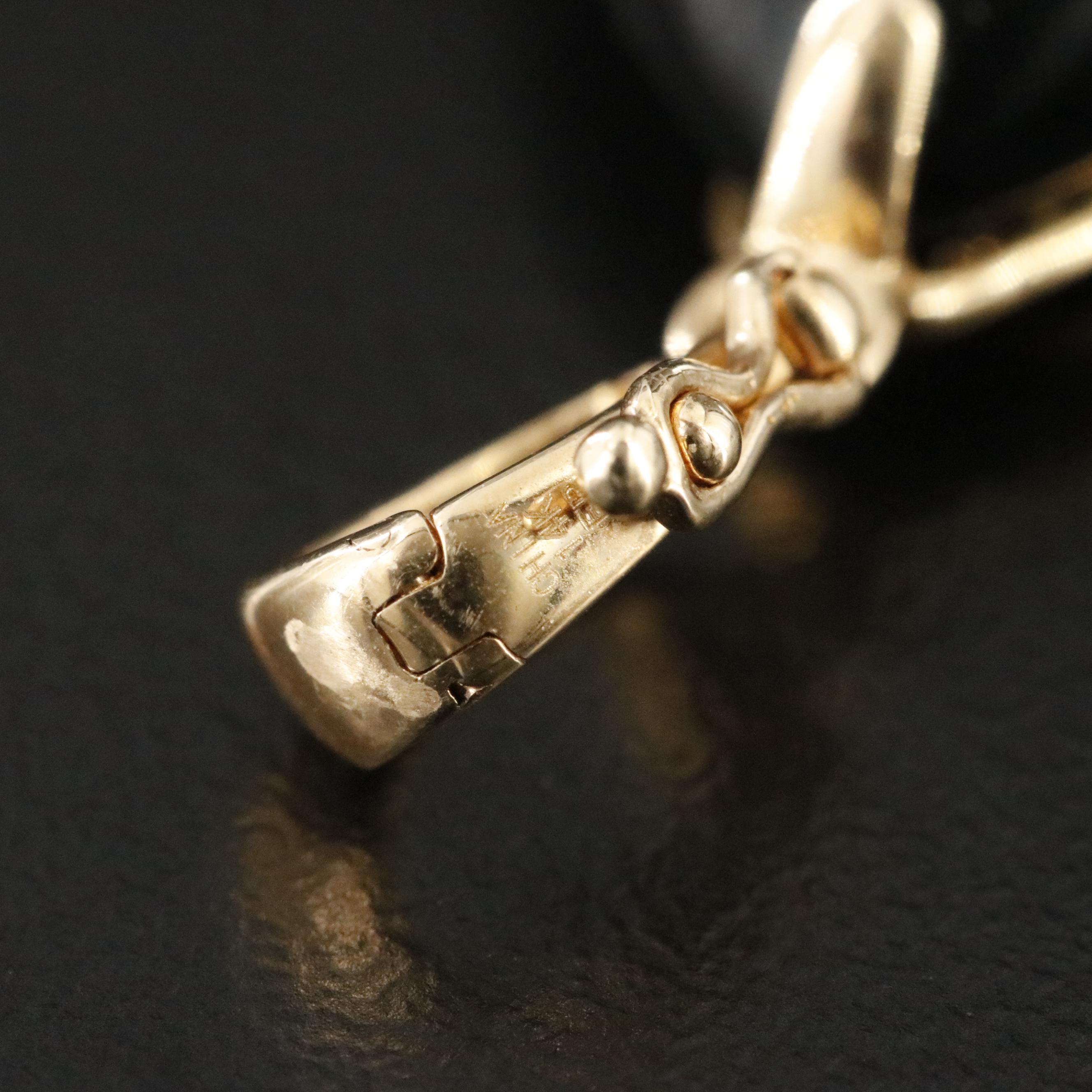 14K Black Onyx Scroll Detail Pendant