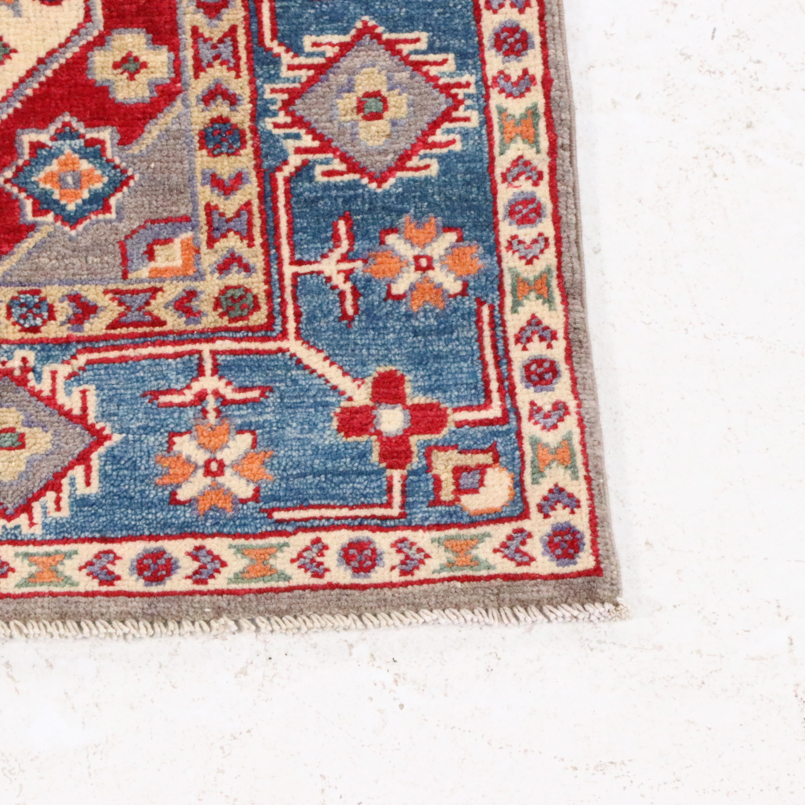 4'1 x 6' Hand-Knotted Pakistani Kazak Area Rug