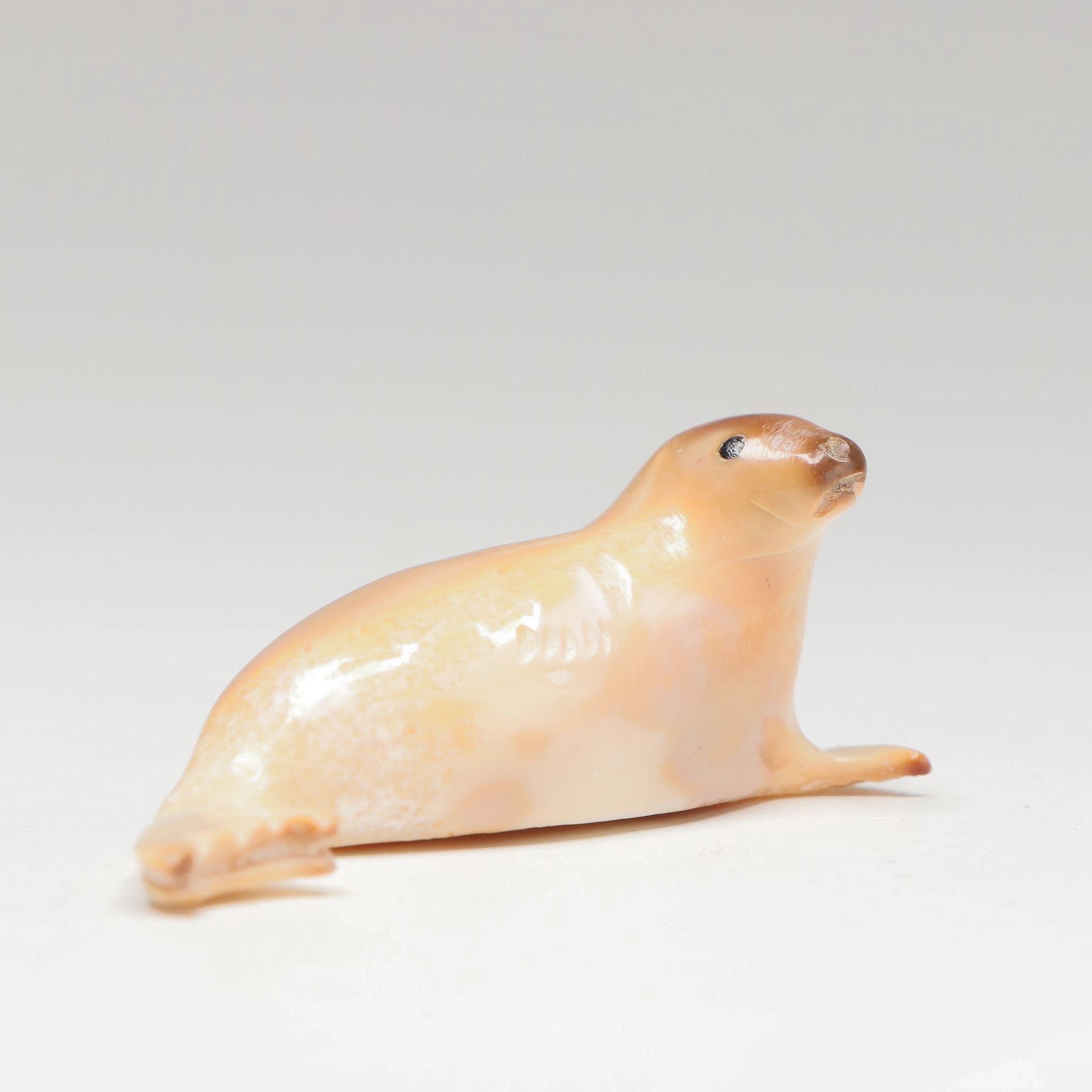 Inuit Carved Fossilized Walrus Ivory Seal