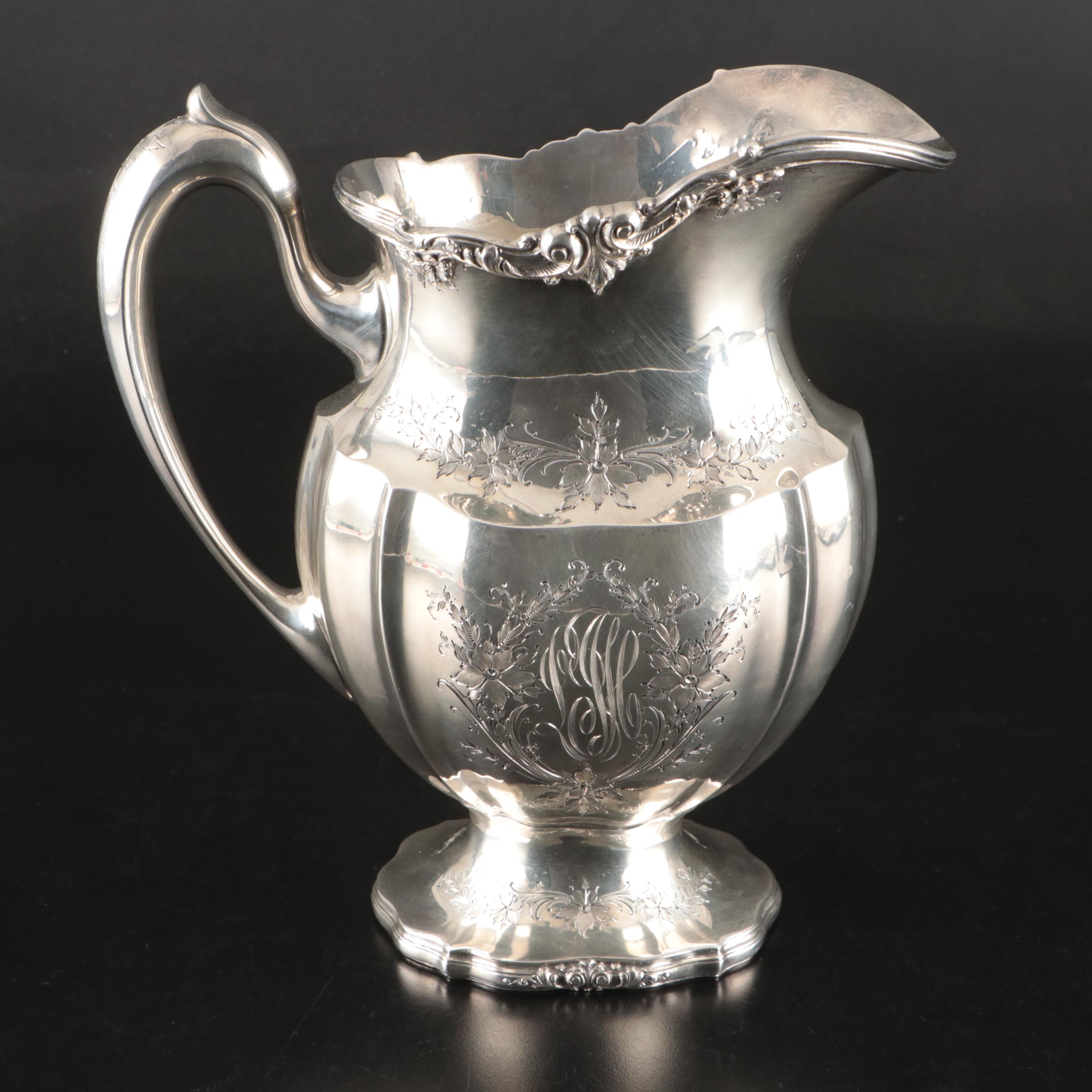 Redlich & Company Chased Floral Sterling Silver Pitcher, Early 20th Century