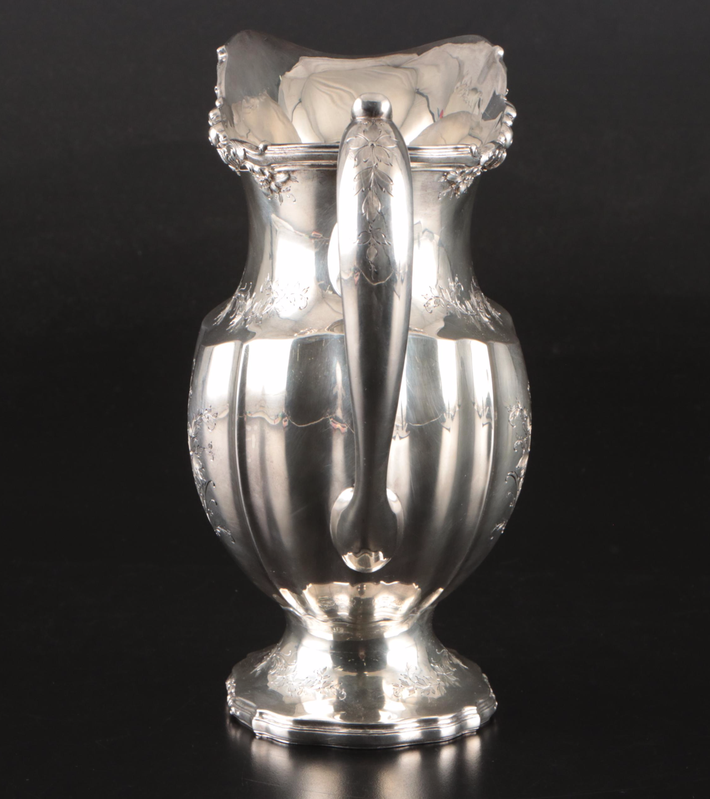 Redlich & Company Chased Floral Sterling Silver Pitcher, Early 20th Century