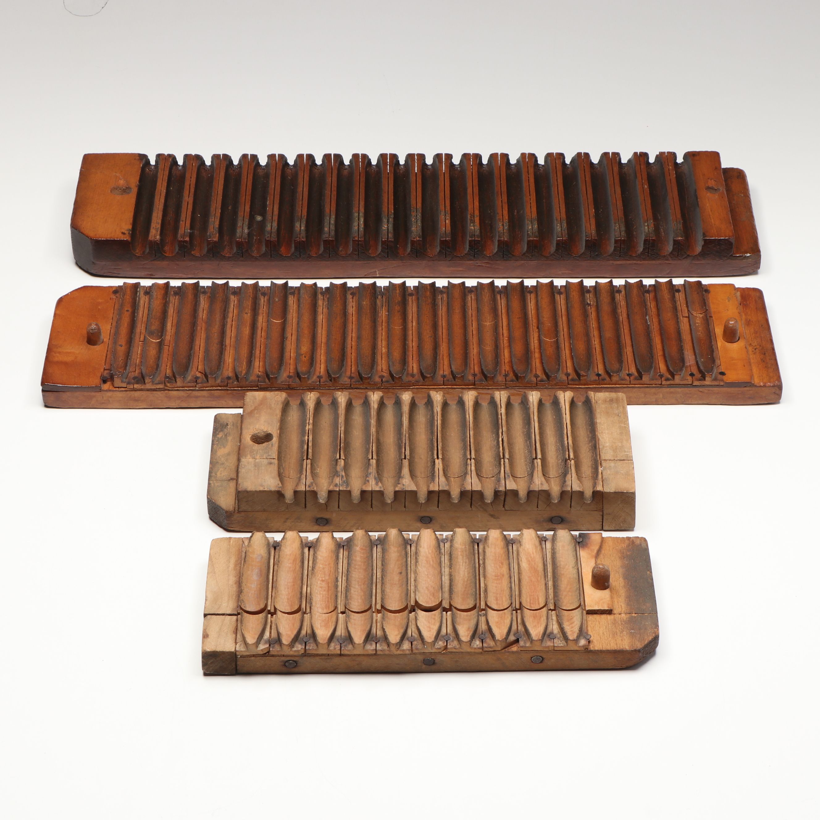 Durex and Other Carved Wooden Cigar Press Molds
