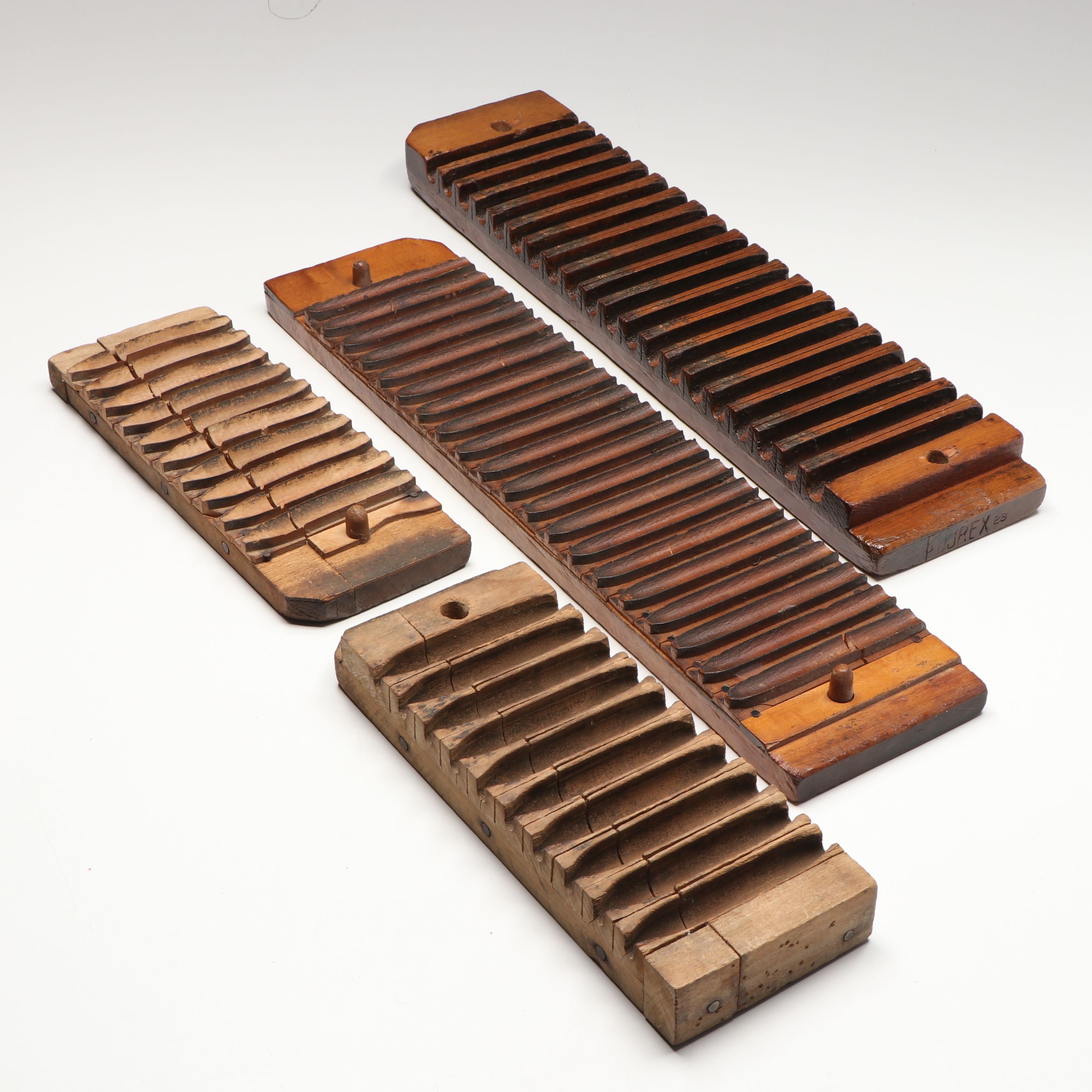 Durex and Other Carved Wooden Cigar Press Molds