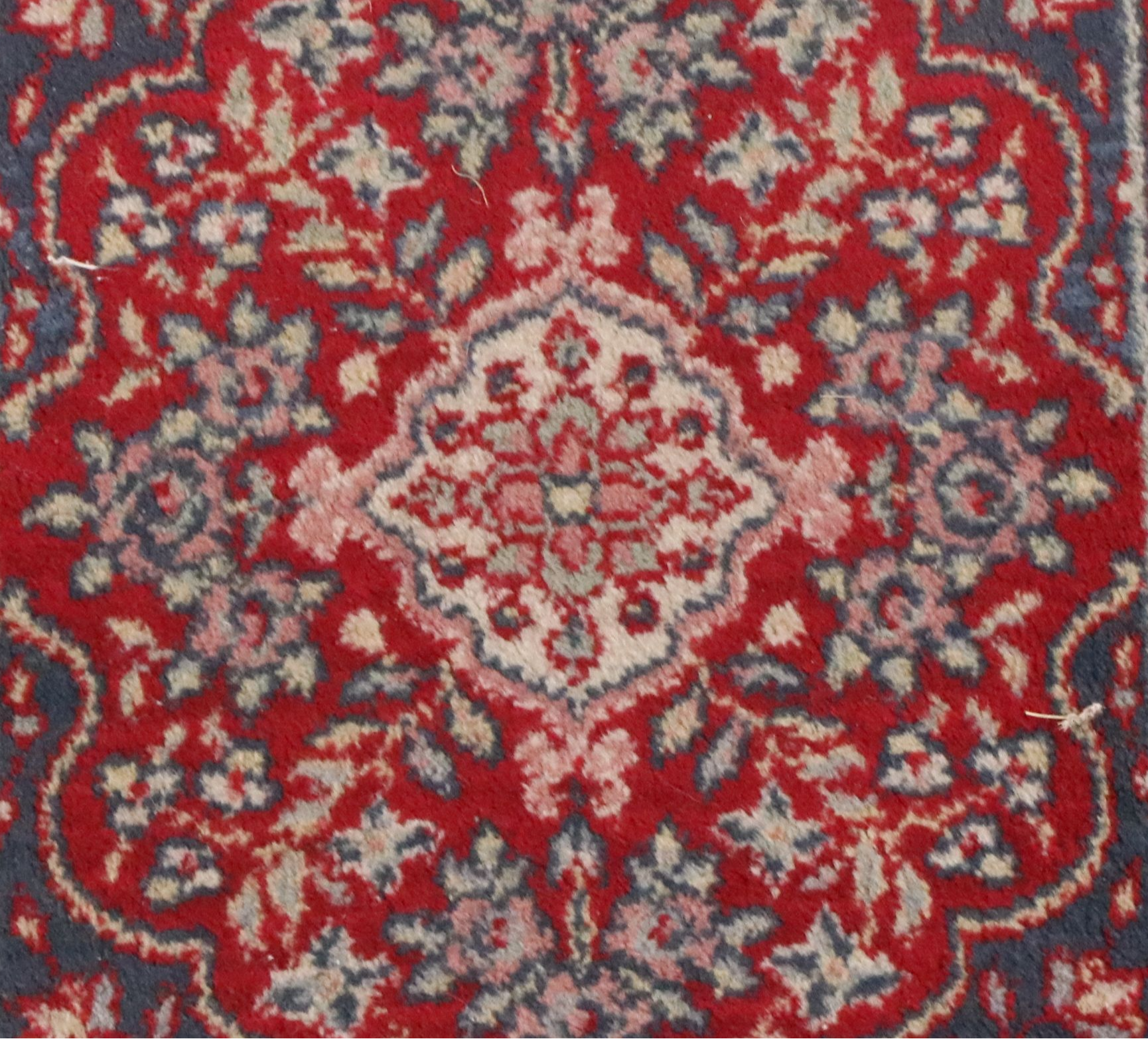 Four Machine-Made Persian Style Accent Rugs