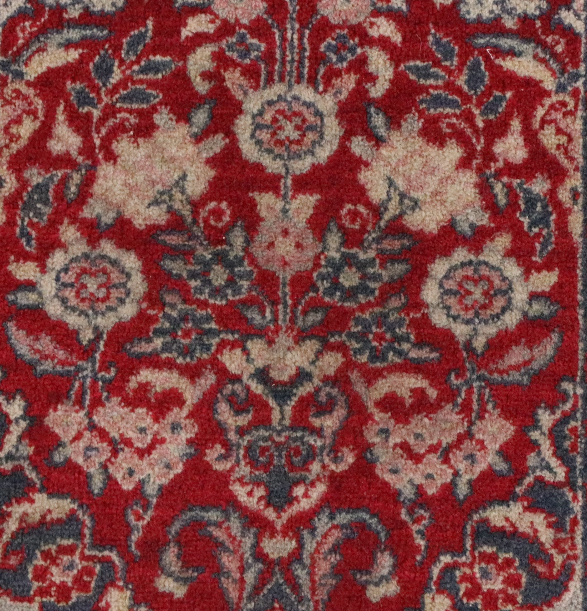Four Machine-Made Persian Style Accent Rugs
