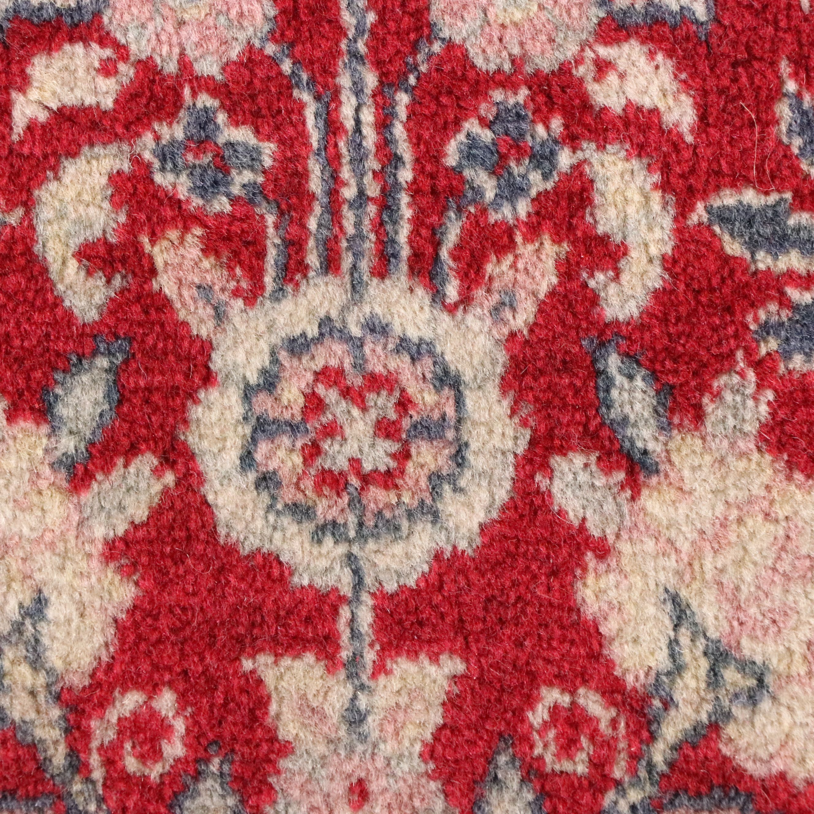 Four Machine-Made Persian Style Accent Rugs
