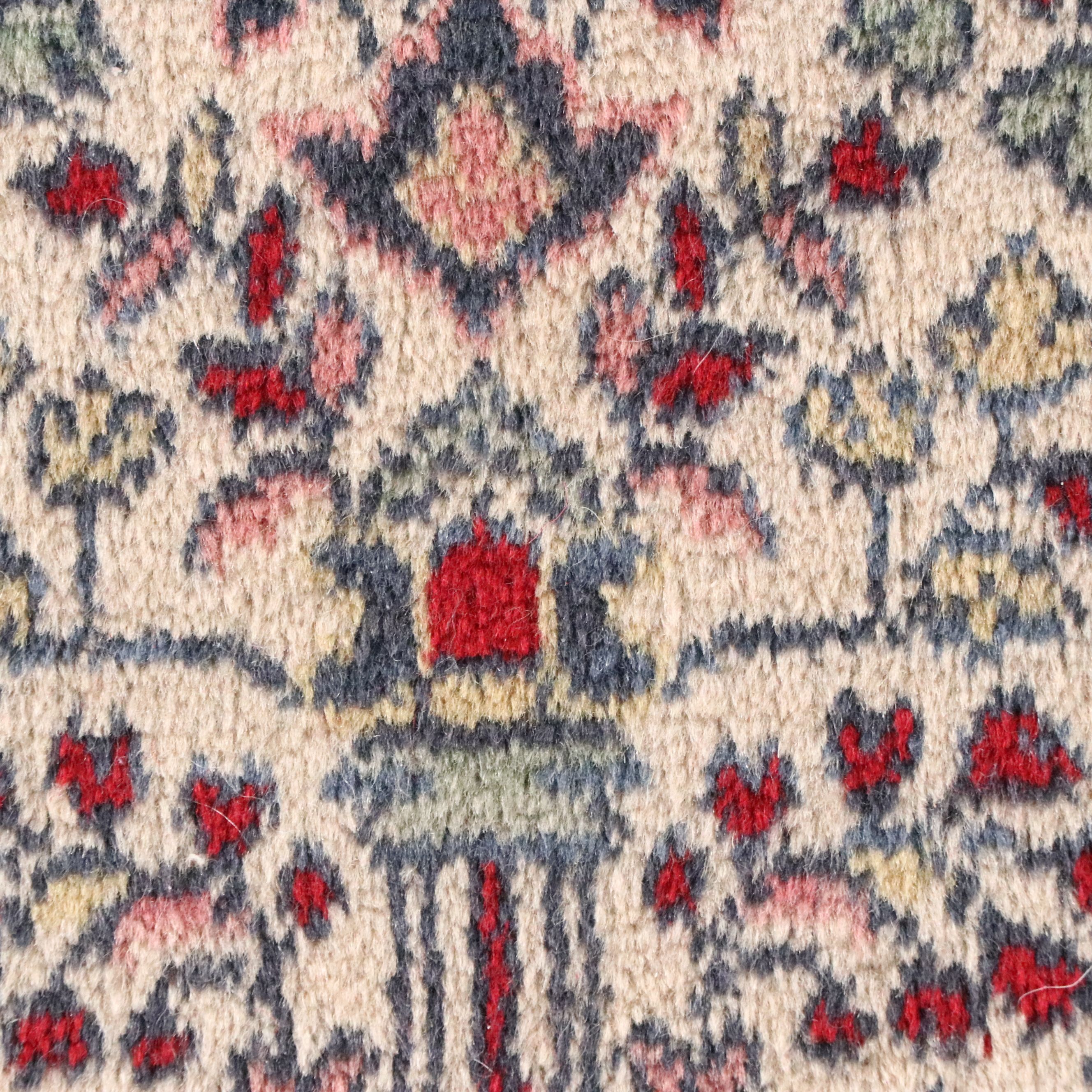 Four Machine-Made Persian Style Accent Rugs