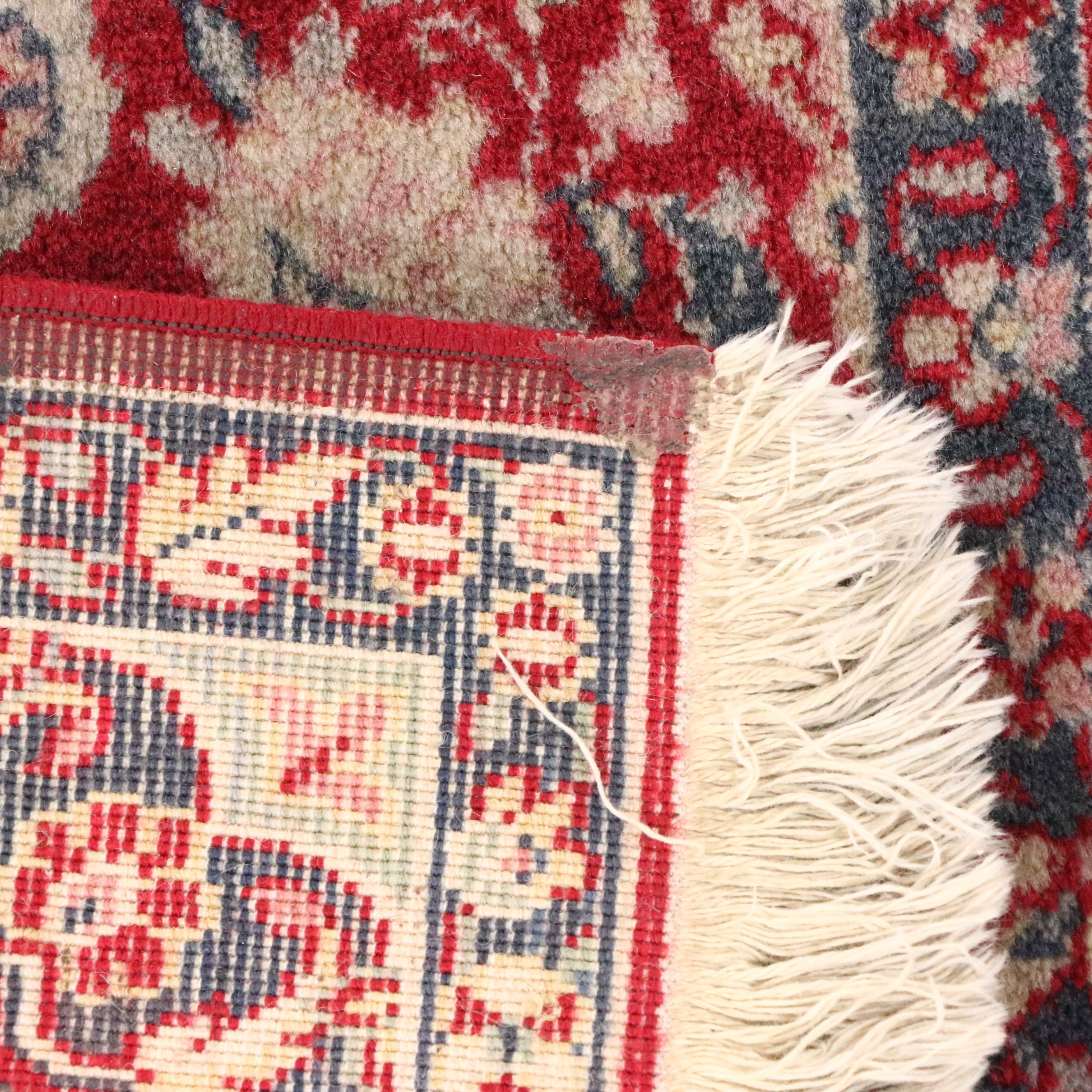 Four Machine-Made Persian Style Accent Rugs