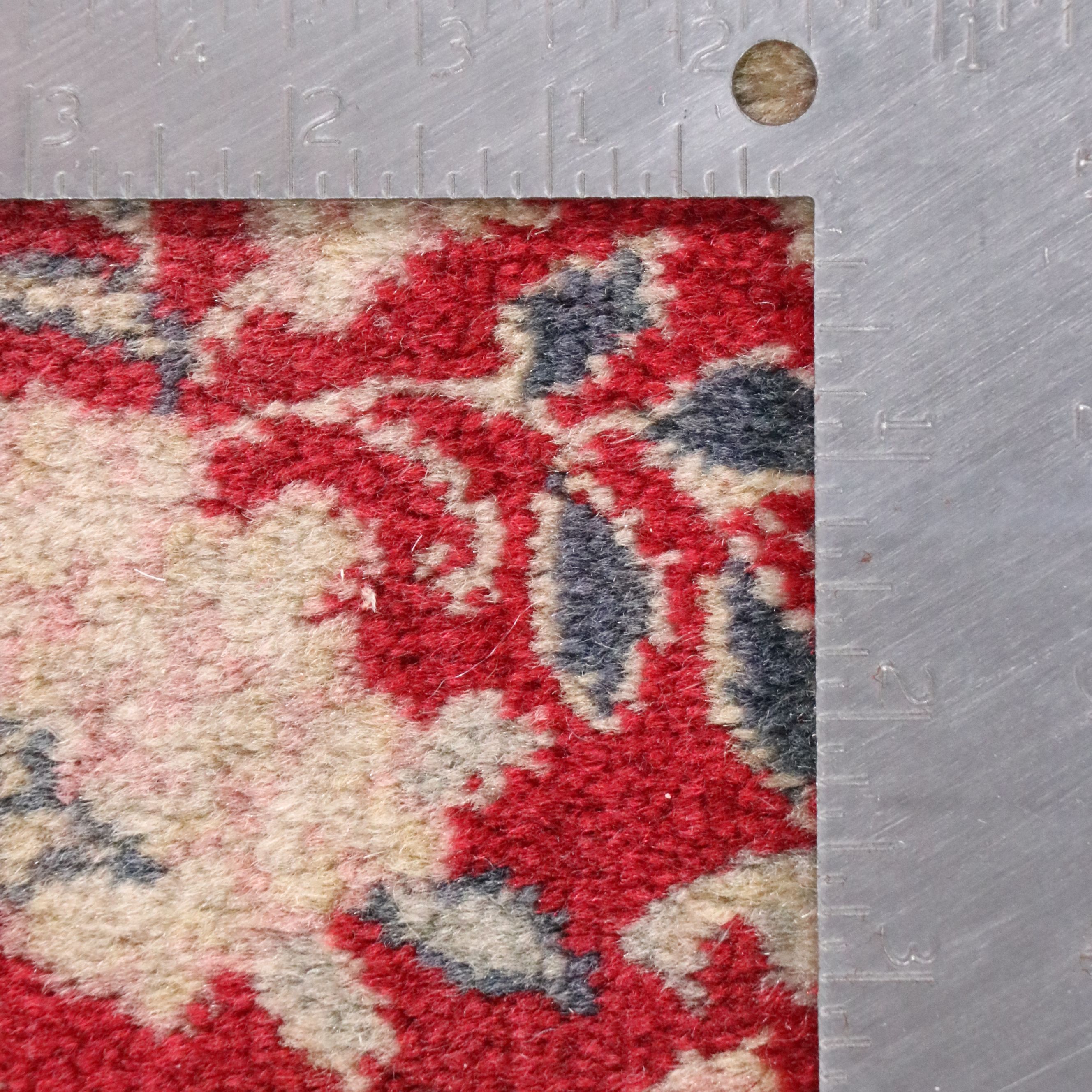 Four Machine-Made Persian Style Accent Rugs