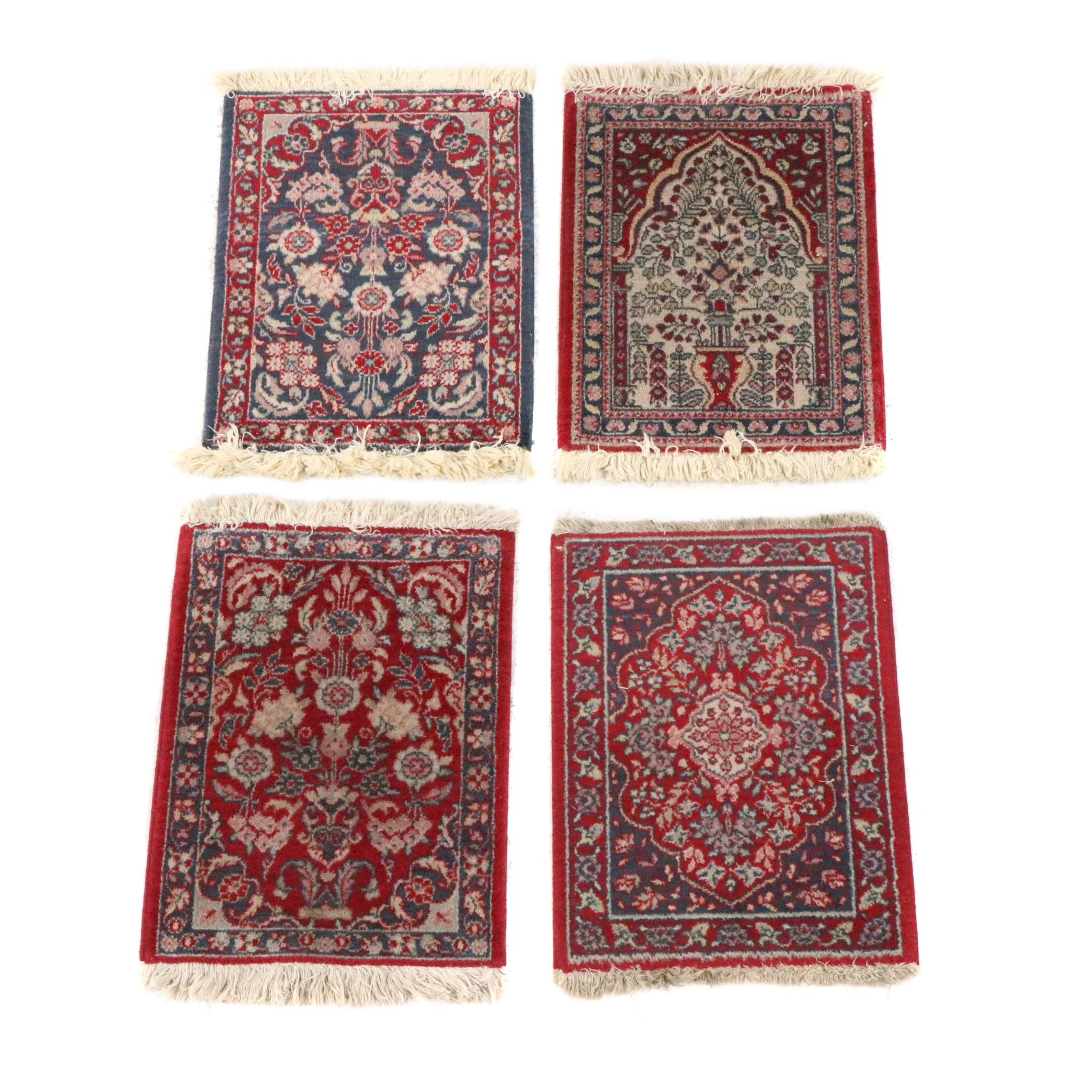 Four Machine-Made Persian Style Accent Rugs