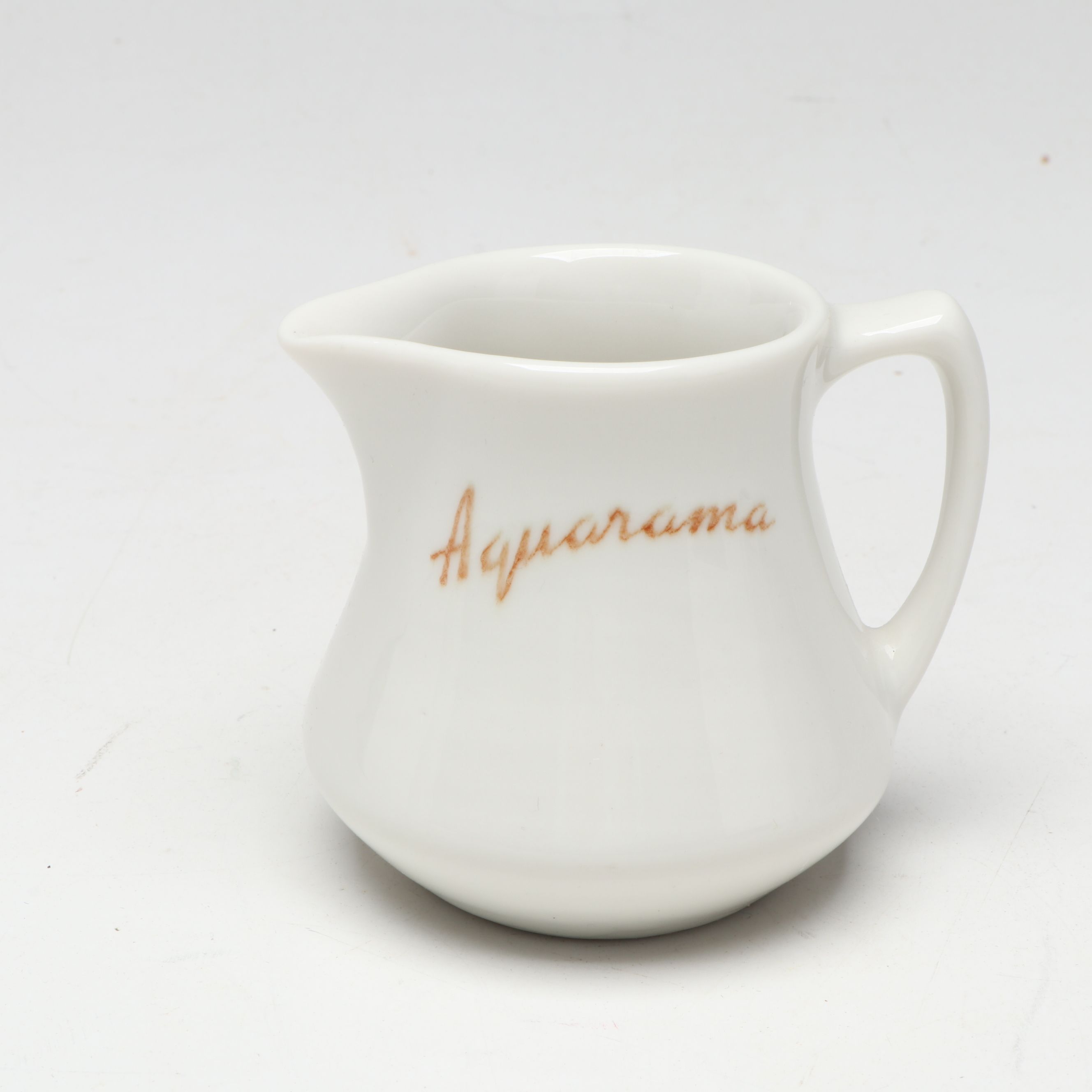 S.S. Aquarama Pennant, Creamer, Cup and Peaked Cap, Mid-20th Century