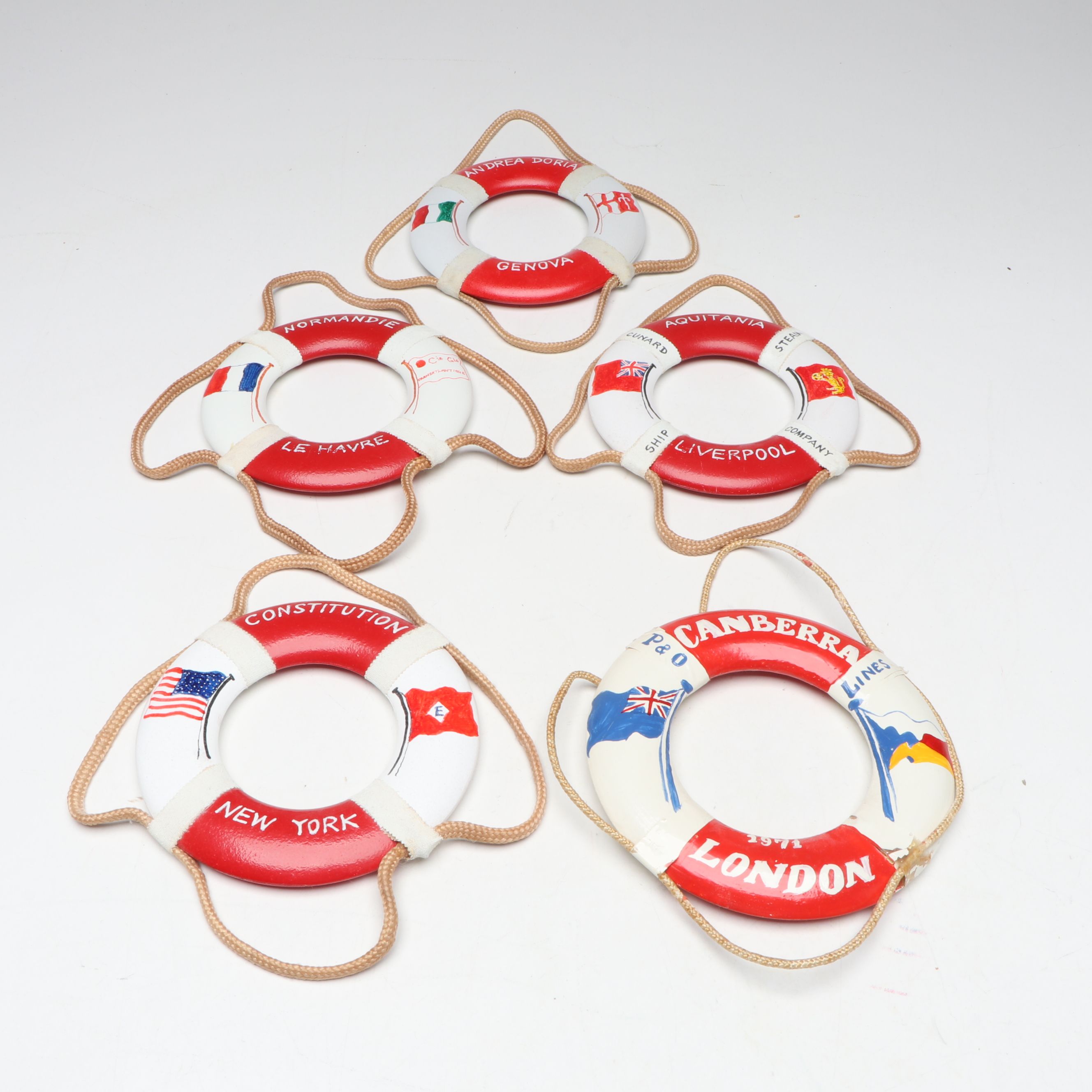 S.S. Normandie, S.S. Constitution with Other Liferaft Wall Hangings