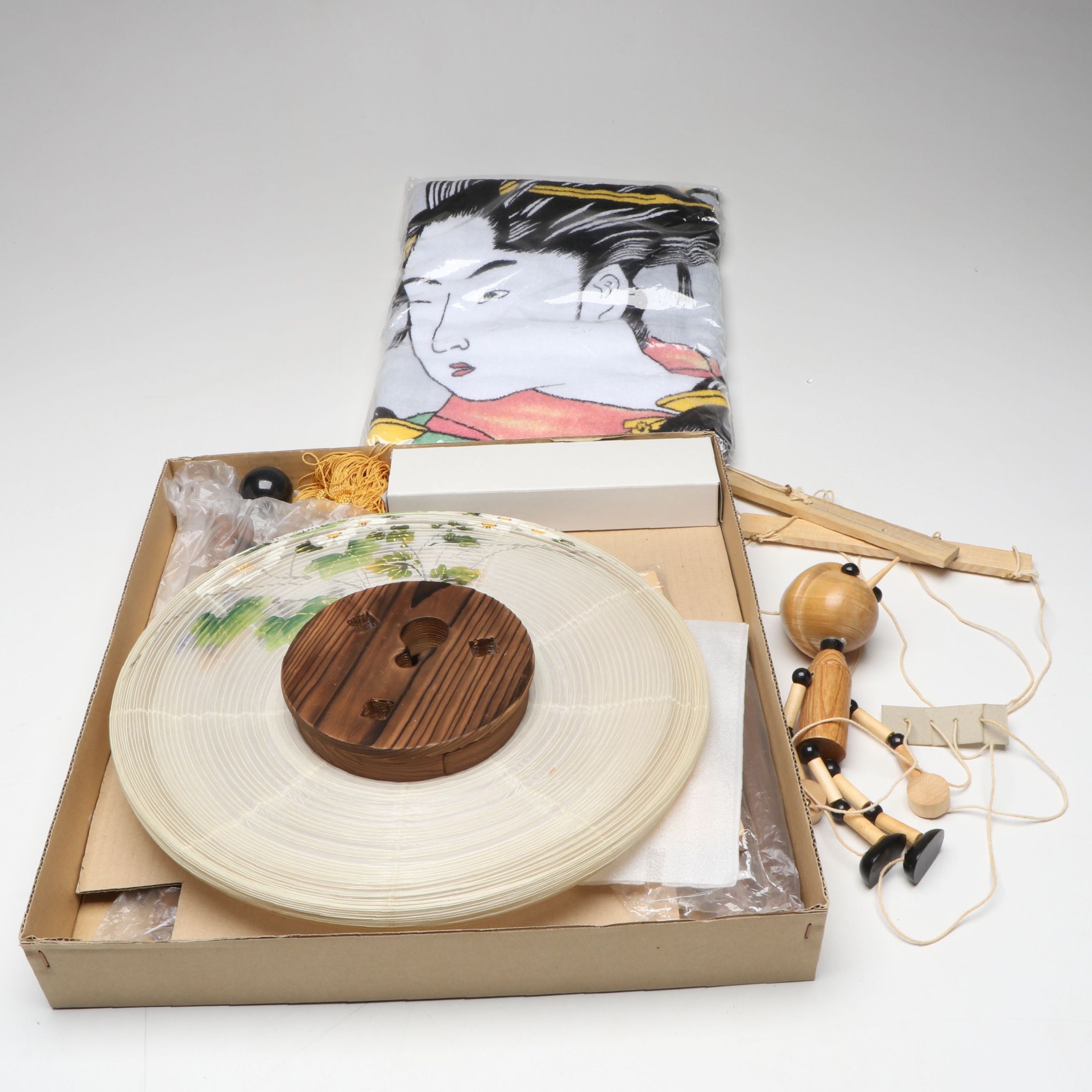 Japanese Ozeki & Co. Gifu Lantern, Other Printed Towel, and Wooden Marionette