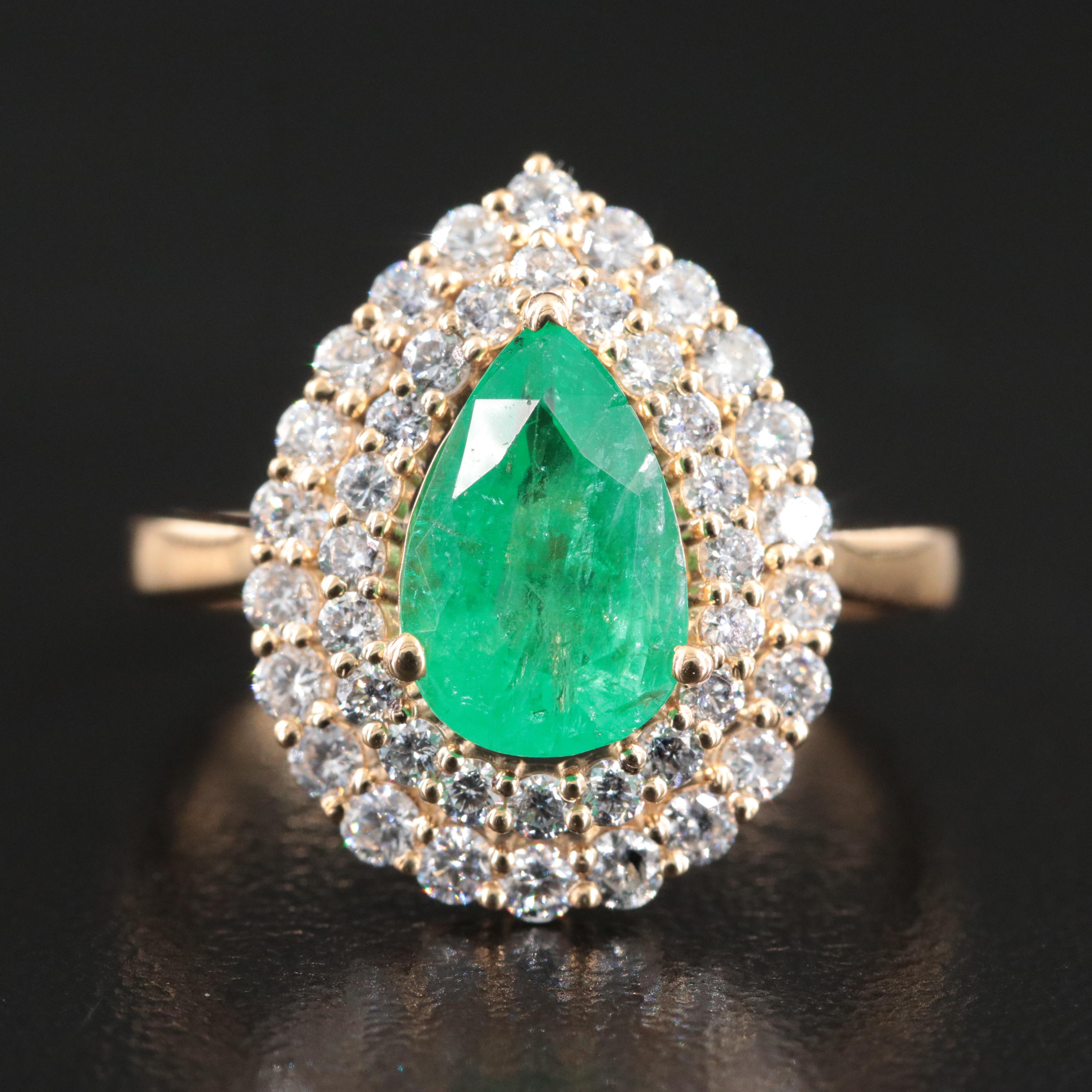 18K 1.28 CT Emerald and 1.77 CTW Diamond Ring