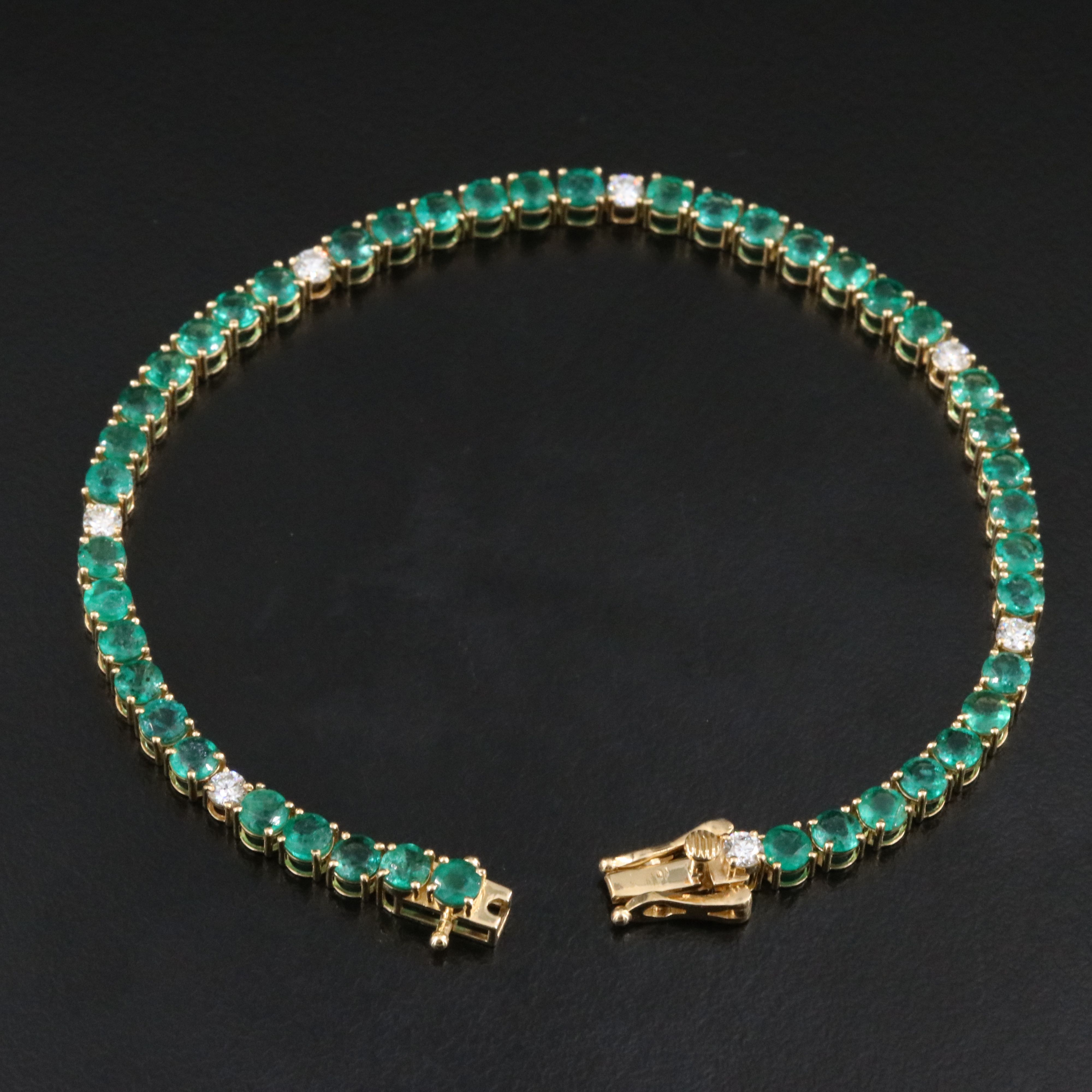 18K 6.78 CTW Emerald and Diamond Line Bracelet