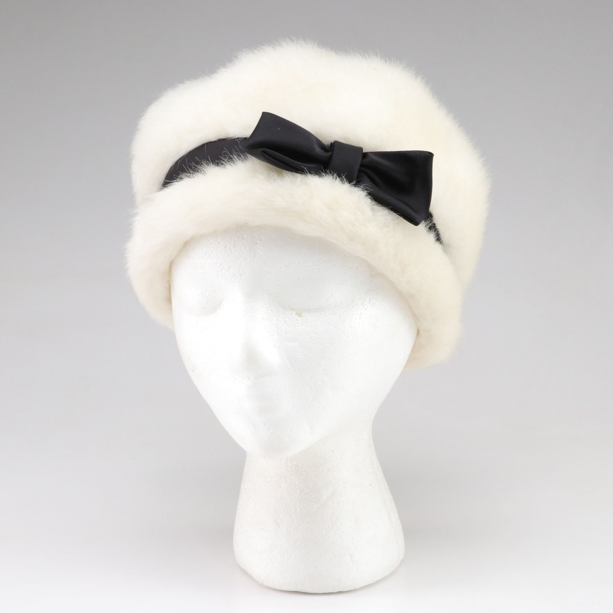 Mod Sheepskin Pom Hat and White Faux Mink Fur Cloche, Mid-20th C.