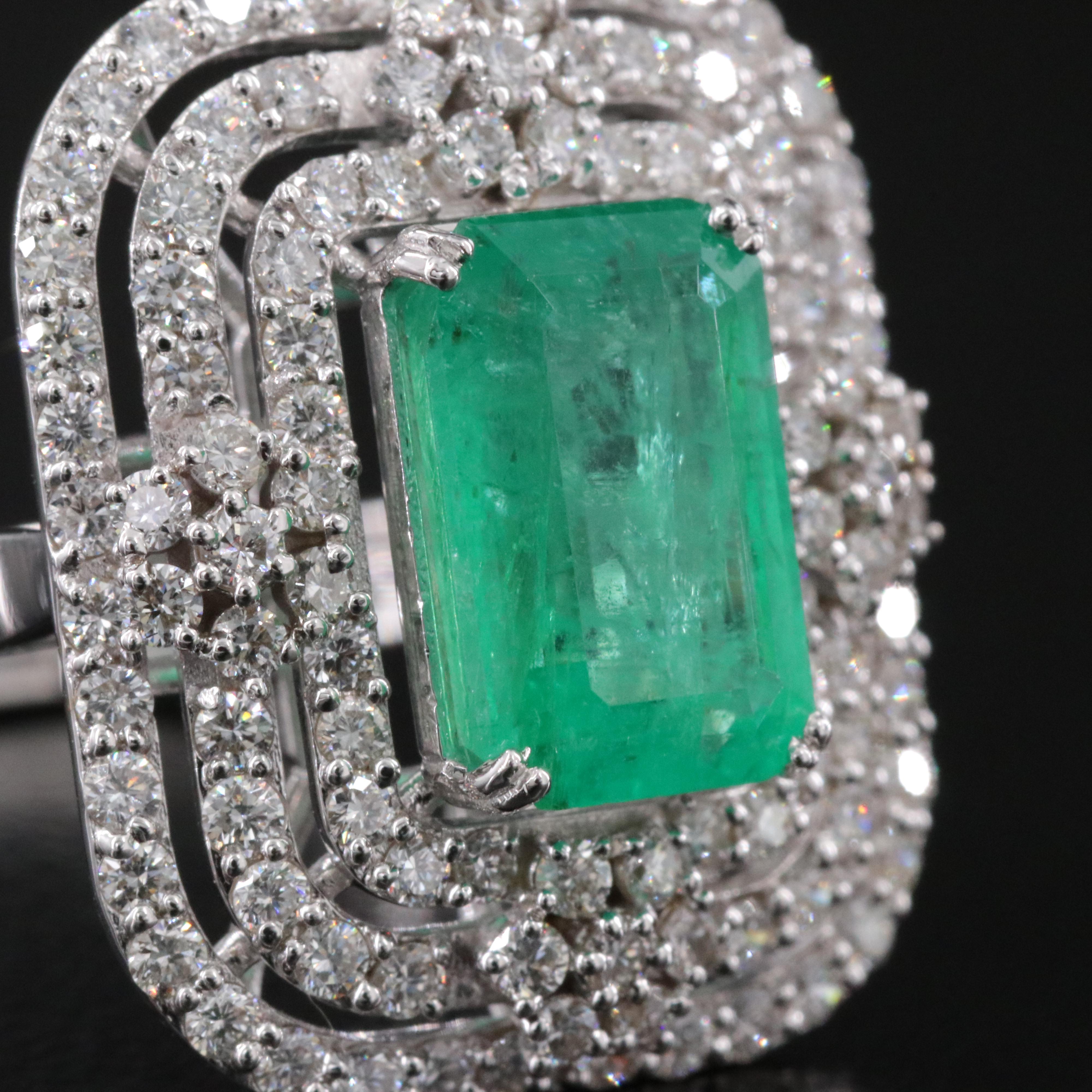 18K 2.82 CT Emerald and 1.30 CTW Diamond Ring