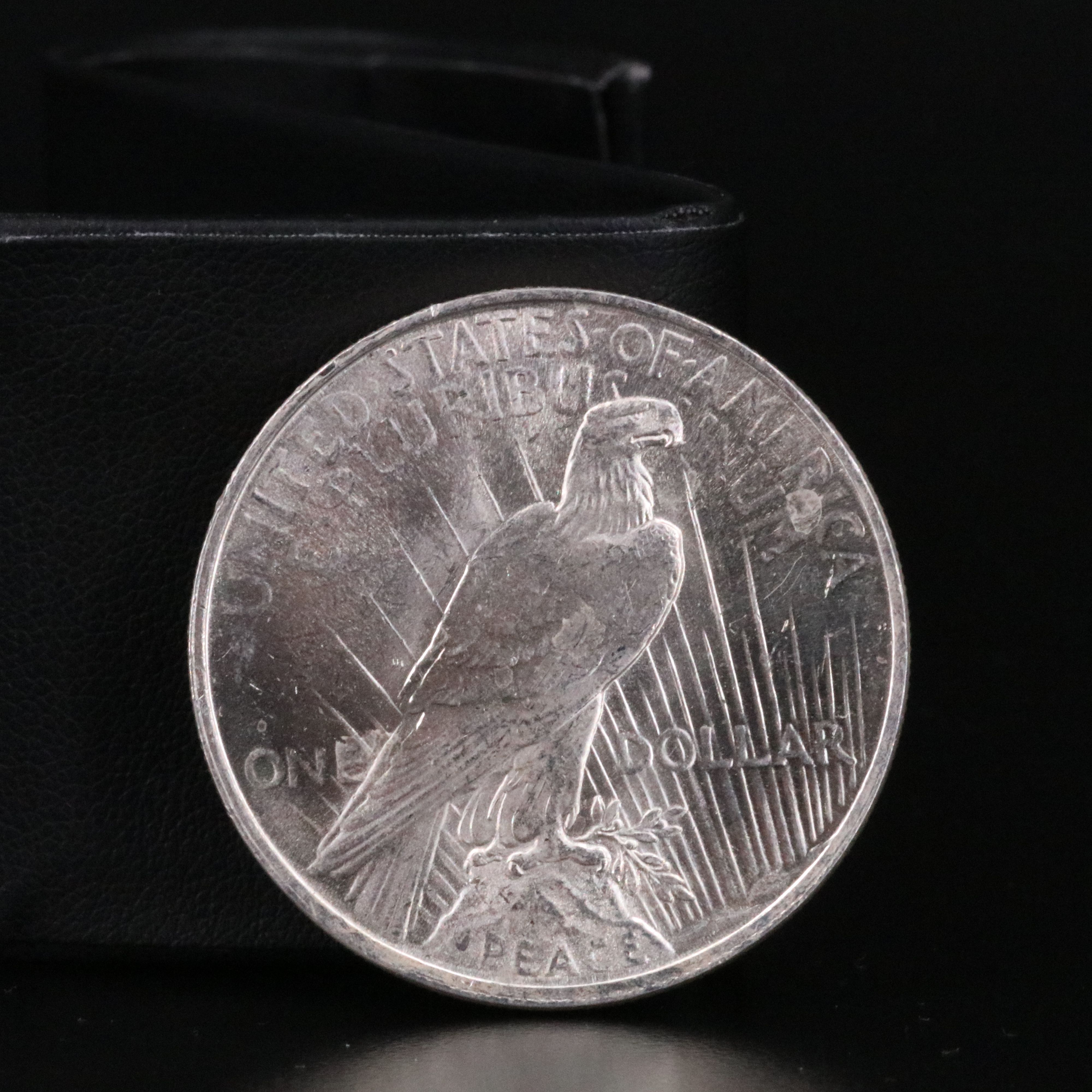 Three Different Uncirculated  U.S. Morgan and Peace Silver Dollars