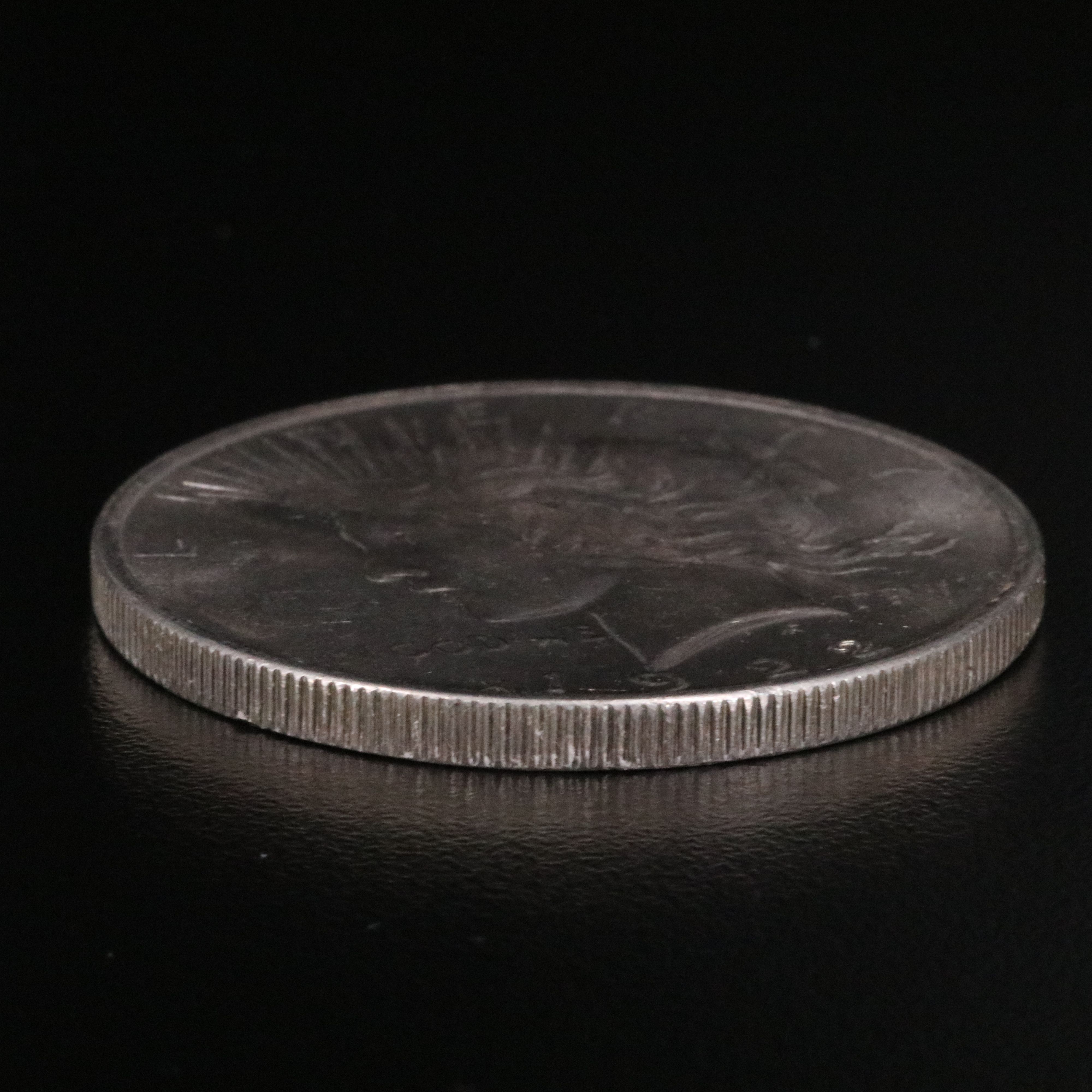 Three Different Uncirculated  U.S. Morgan and Peace Silver Dollars