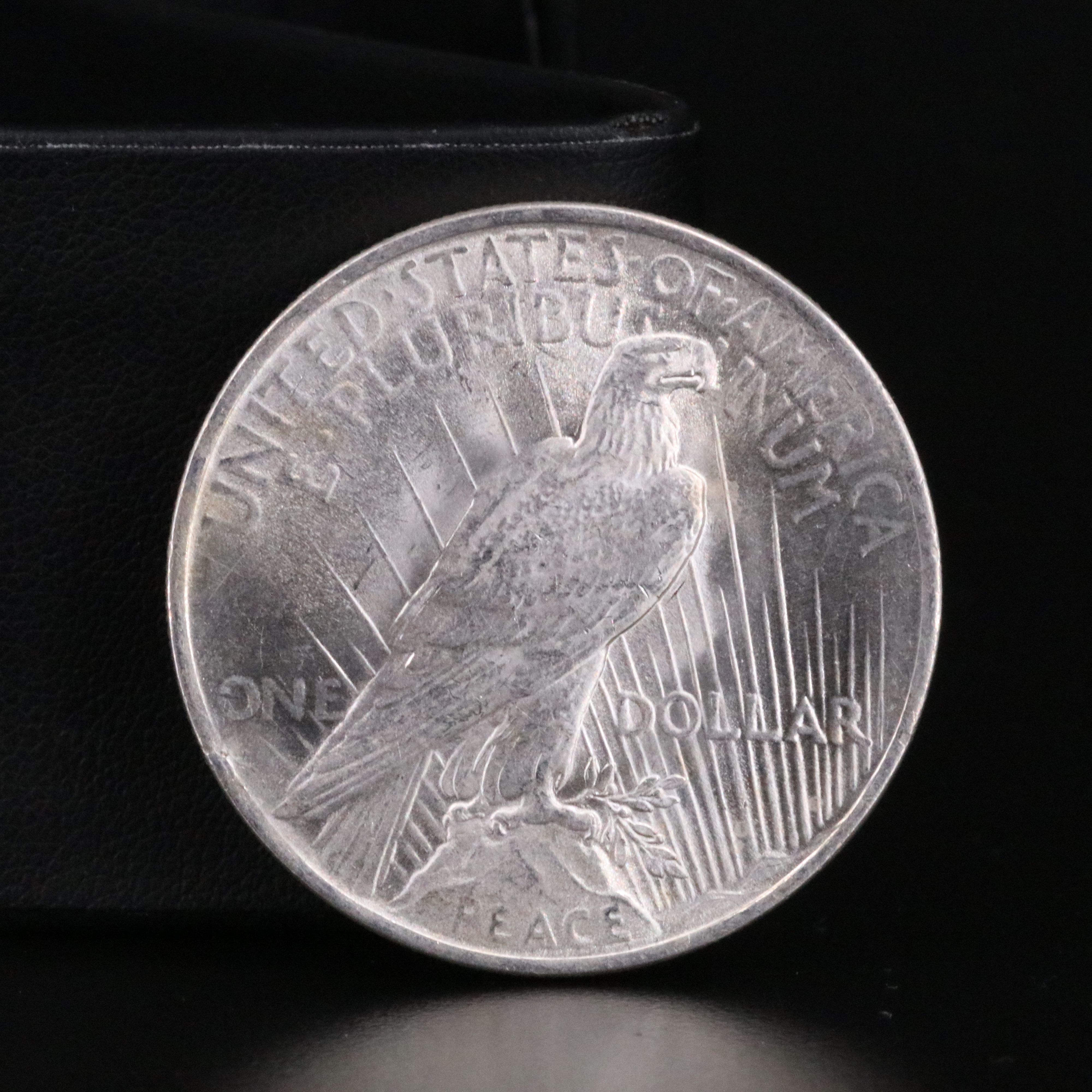 Three Different Uncirculated  U.S. Morgan and Peace Silver Dollars