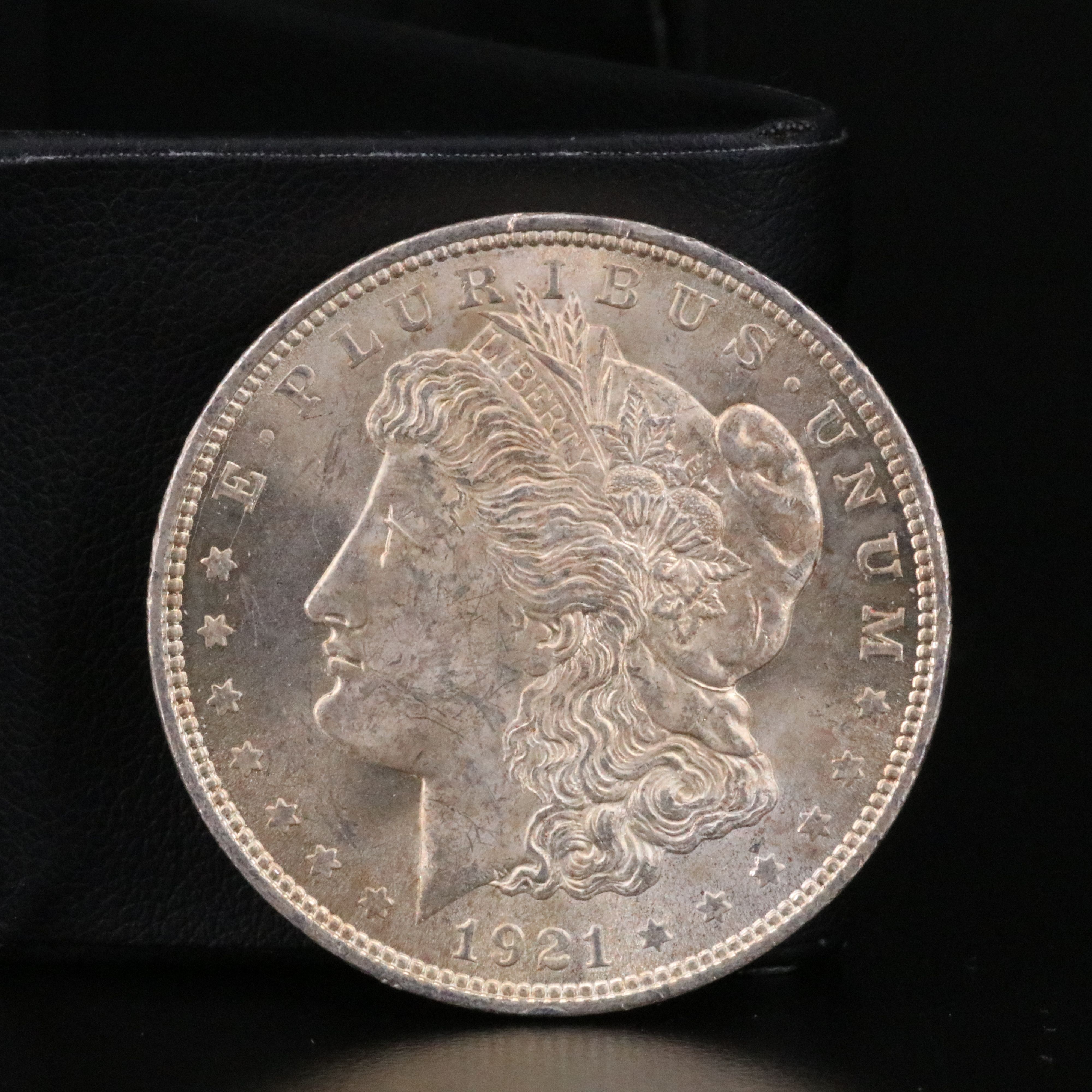 Three Different Uncirculated  U.S. Morgan and Peace Silver Dollars