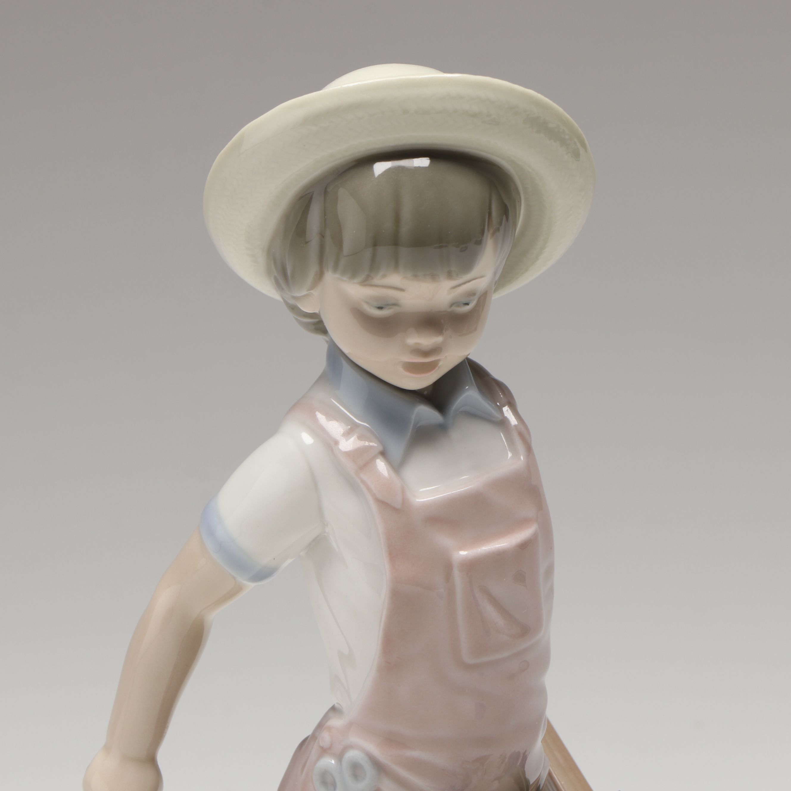 Lladró "Wheelbarrow with Flowers Boy" Porcelain Figurine