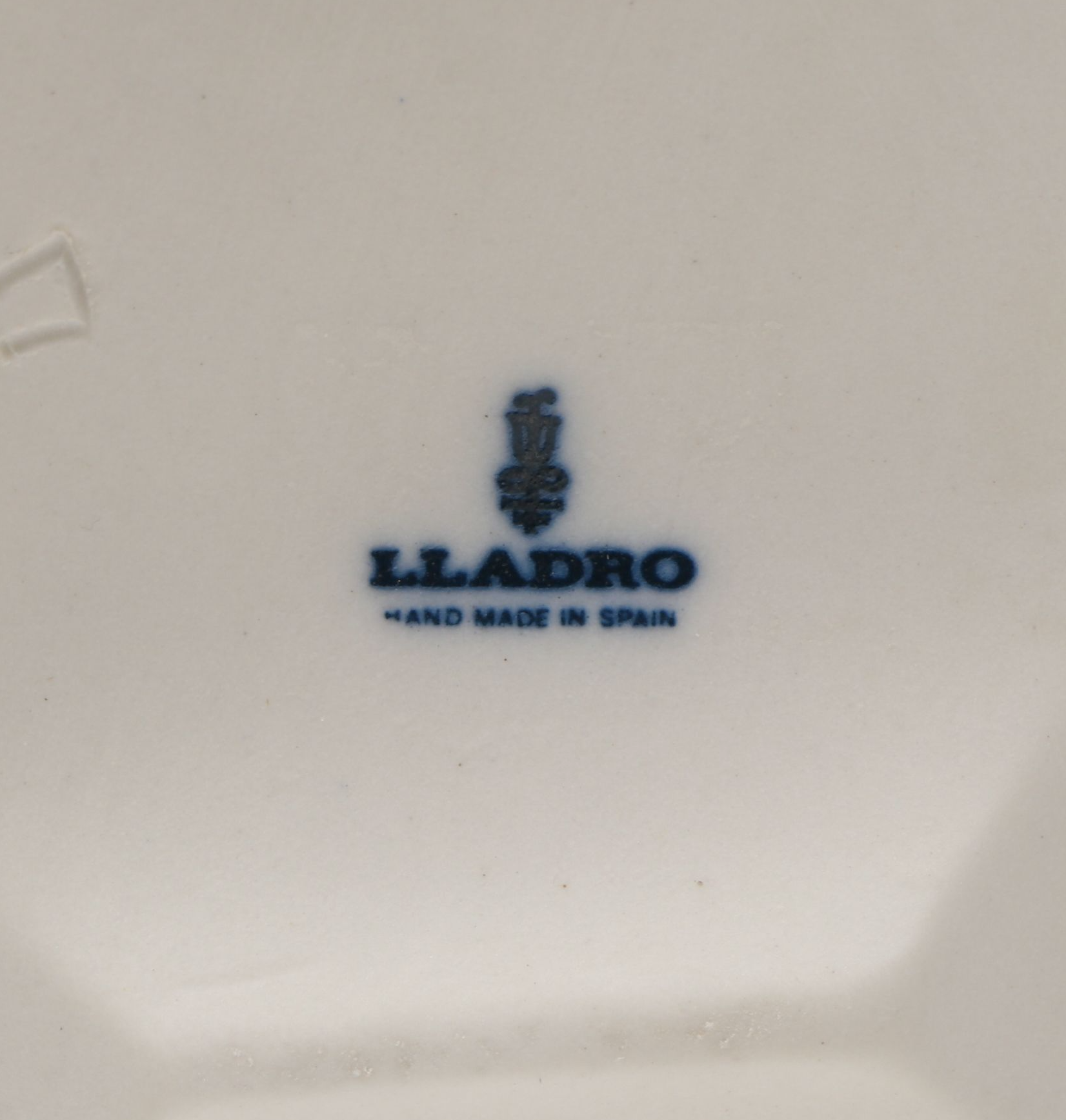 Lladró "Wheelbarrow with Flowers Boy" Porcelain Figurine