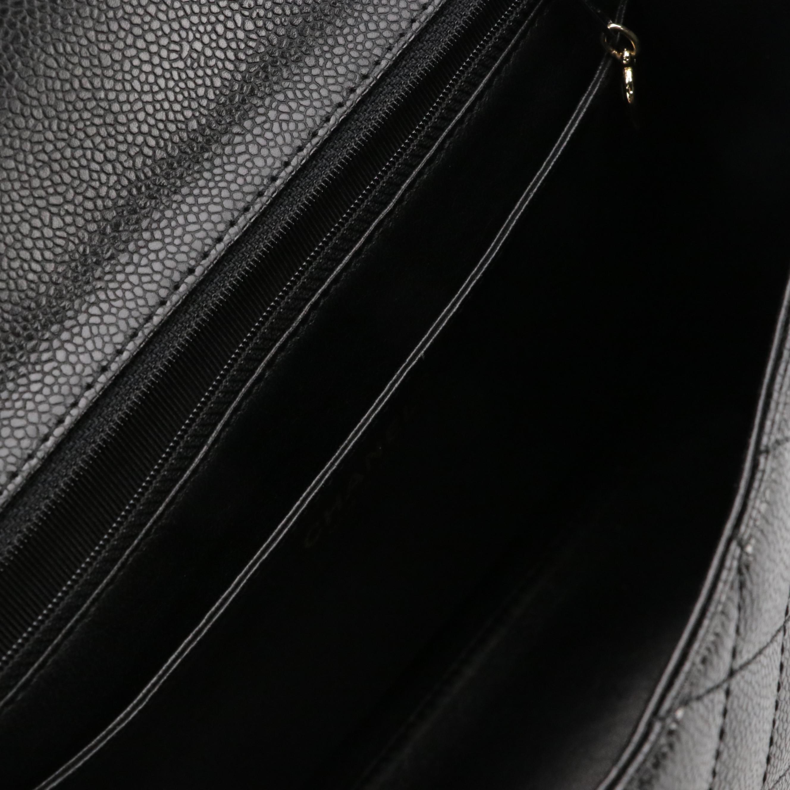 Chanel Kelly Top Handle Bag in Black Caviar Leather with Gold Plated Hardware