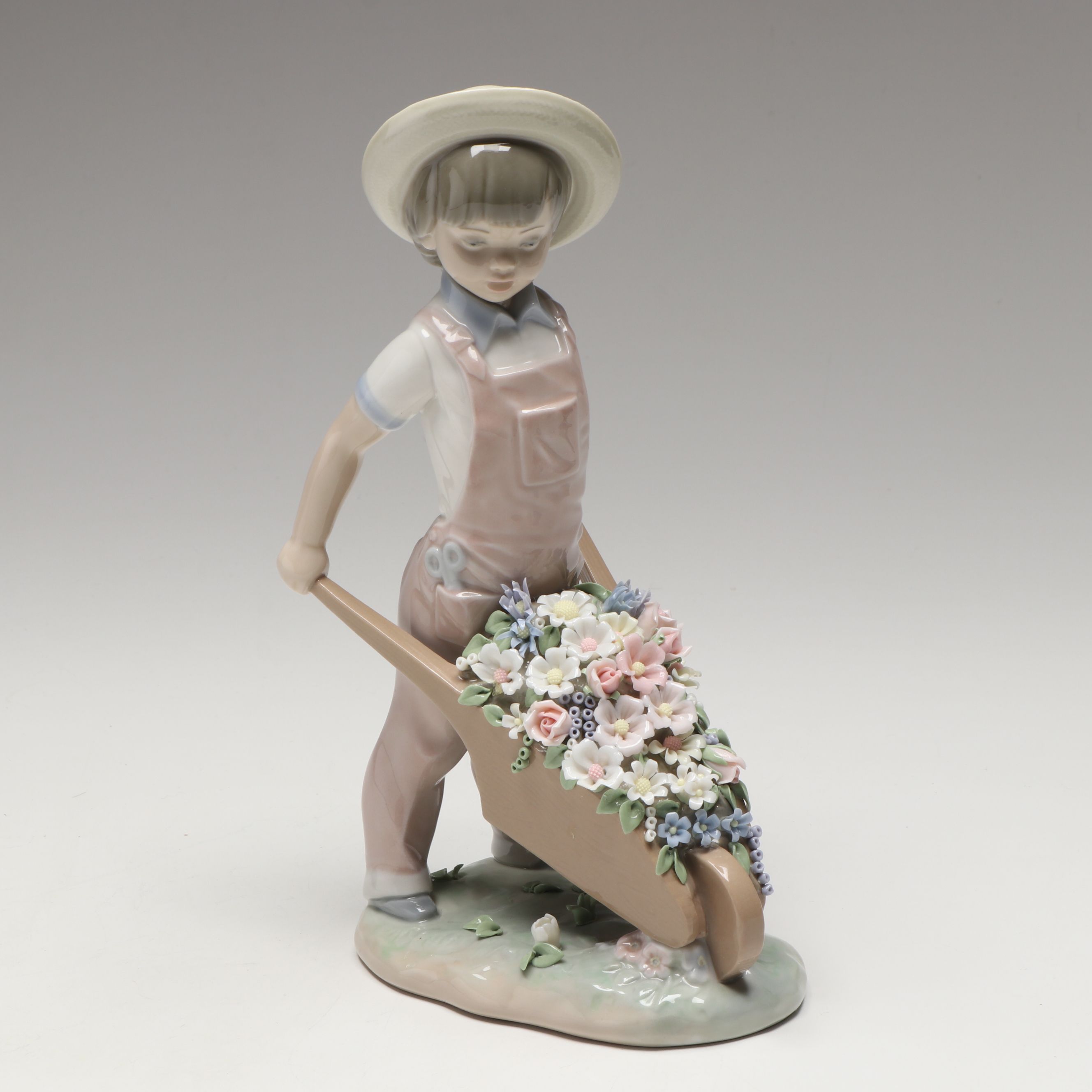 Lladró "Wheelbarrow with Flowers Boy" Porcelain Figurine