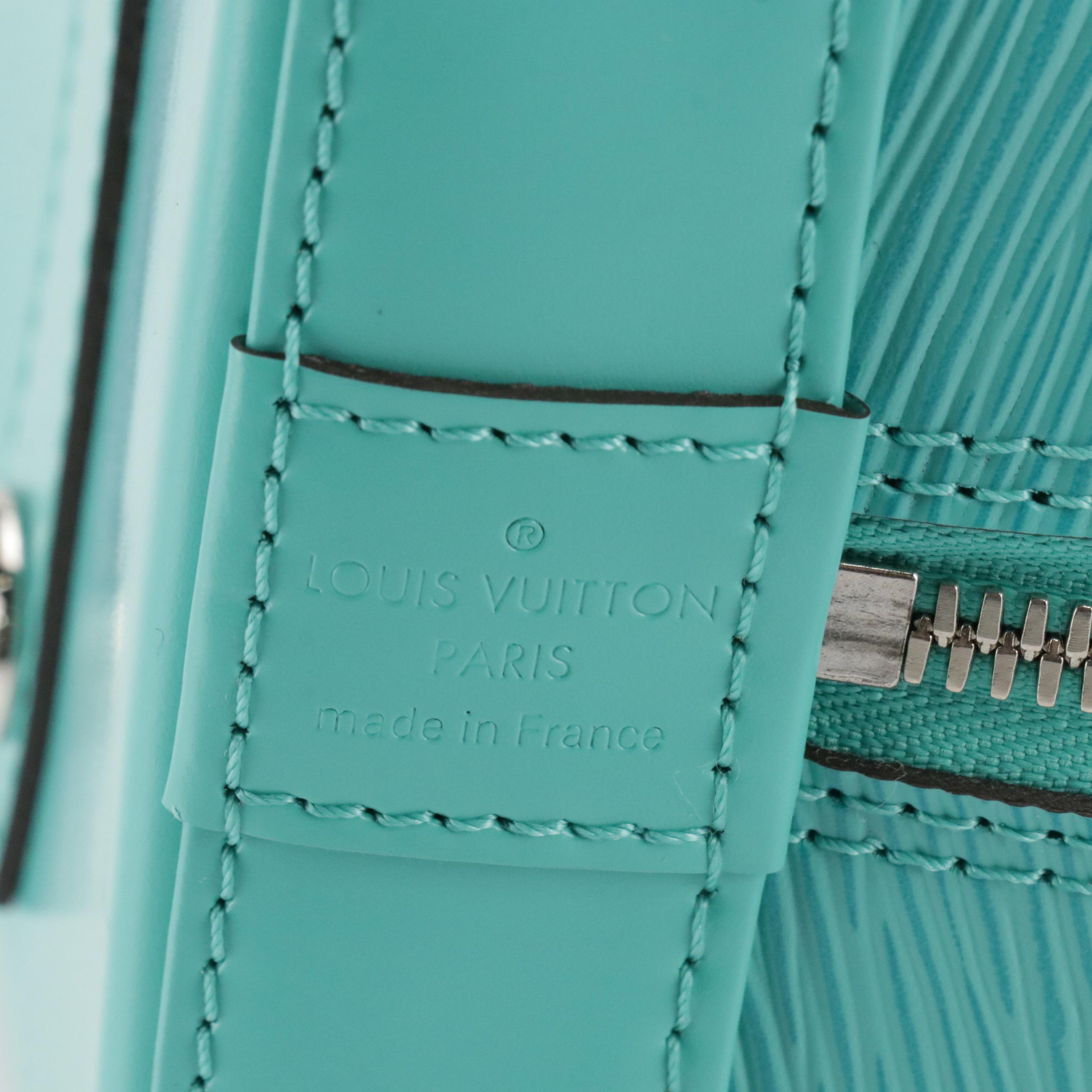 Louis Vuitton Alma PM Handbag in Turquoise Epi and Smooth Leather
