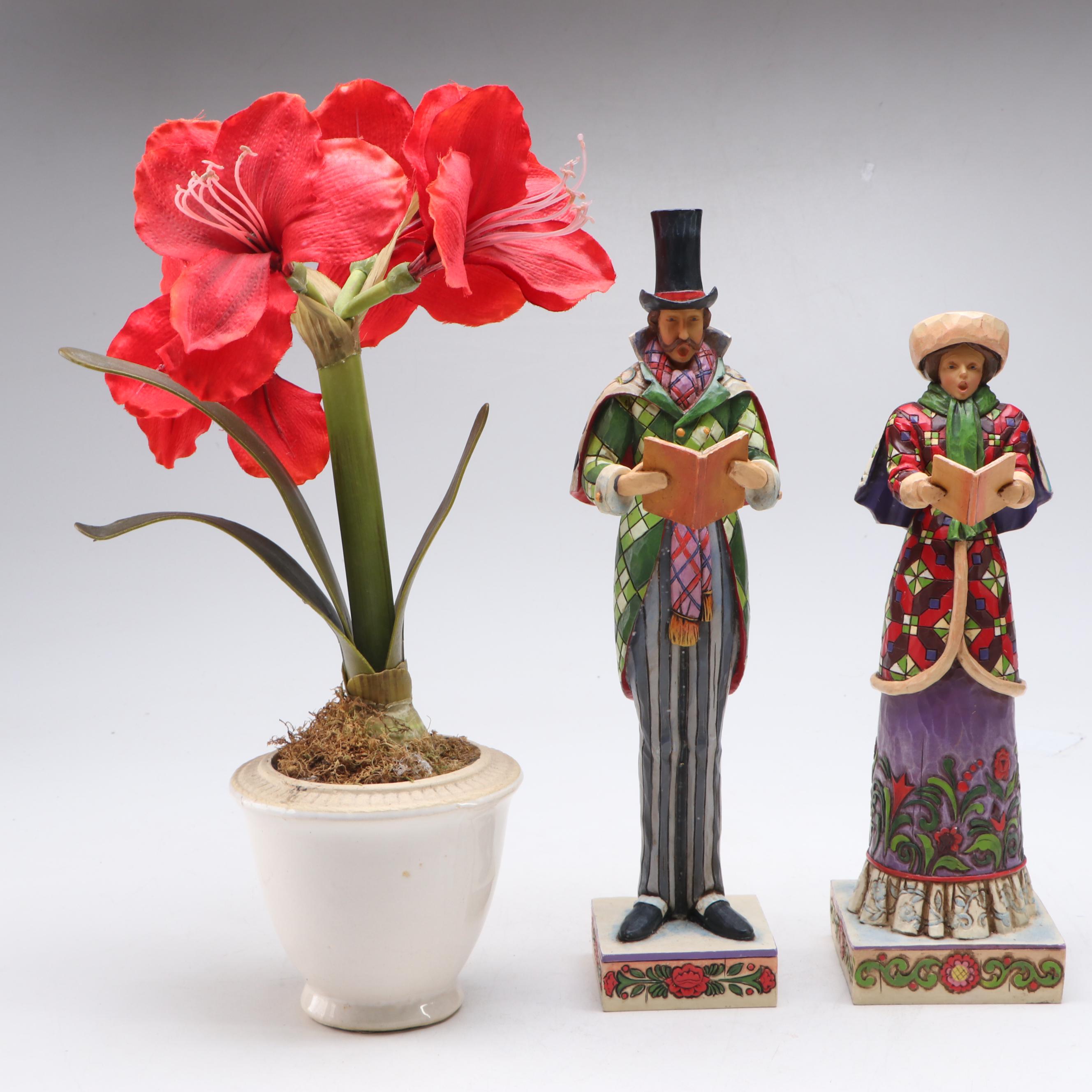Jim Shore Carolers with Painted Glass Window Panel and Artificial Amaryllises