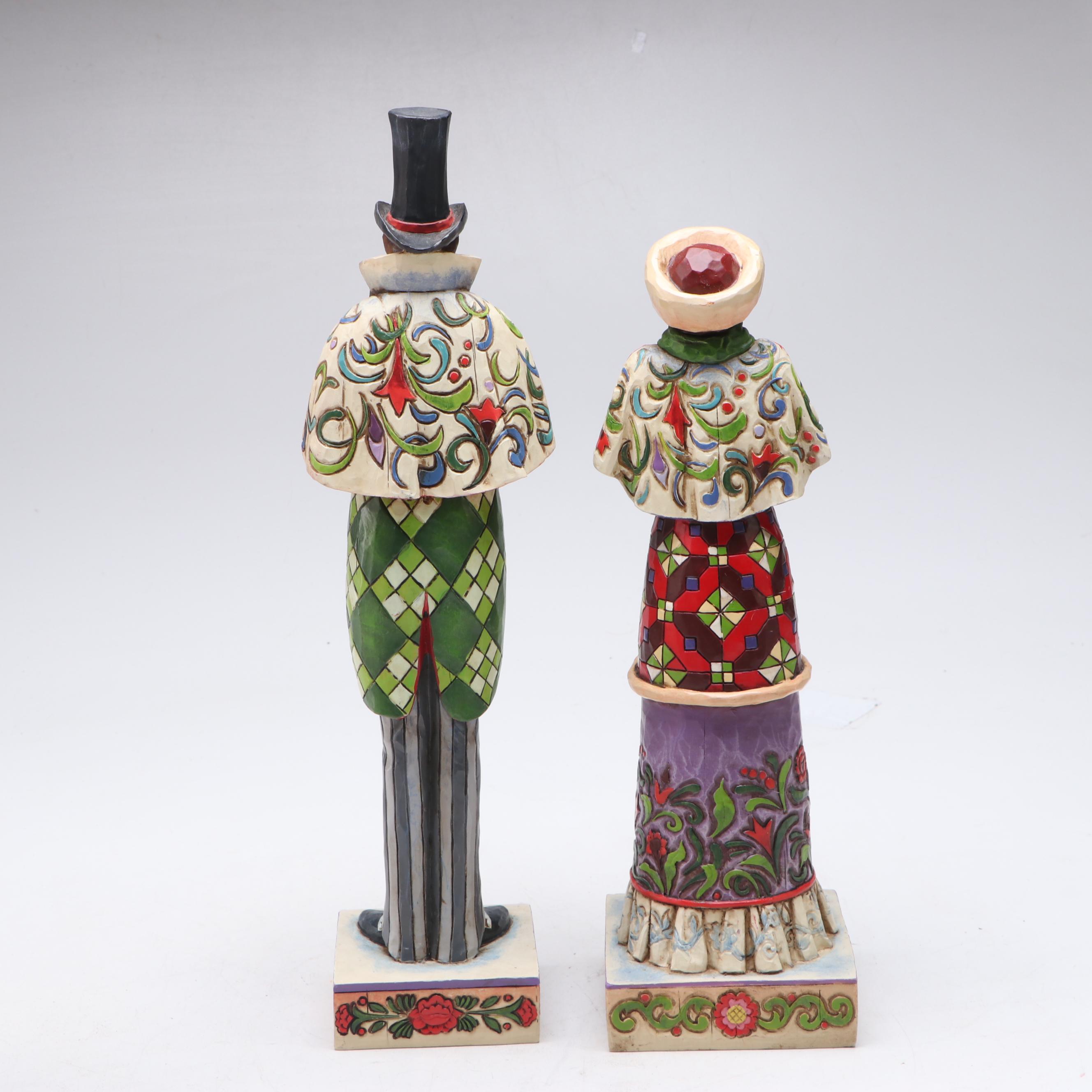 Jim Shore Carolers with Painted Glass Window Panel and Artificial Amaryllises