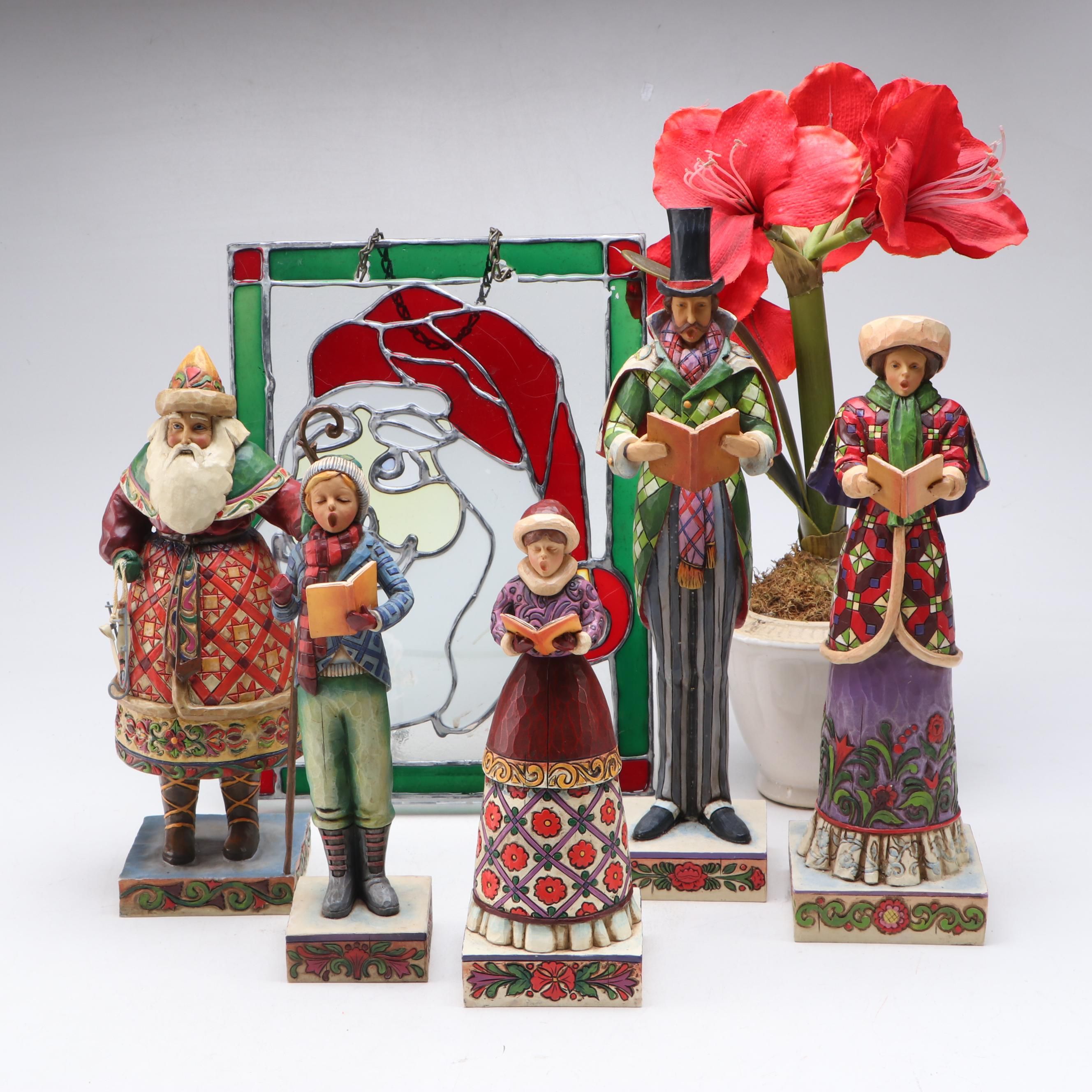 Jim Shore Carolers with Painted Glass Window Panel and Artificial Amaryllises