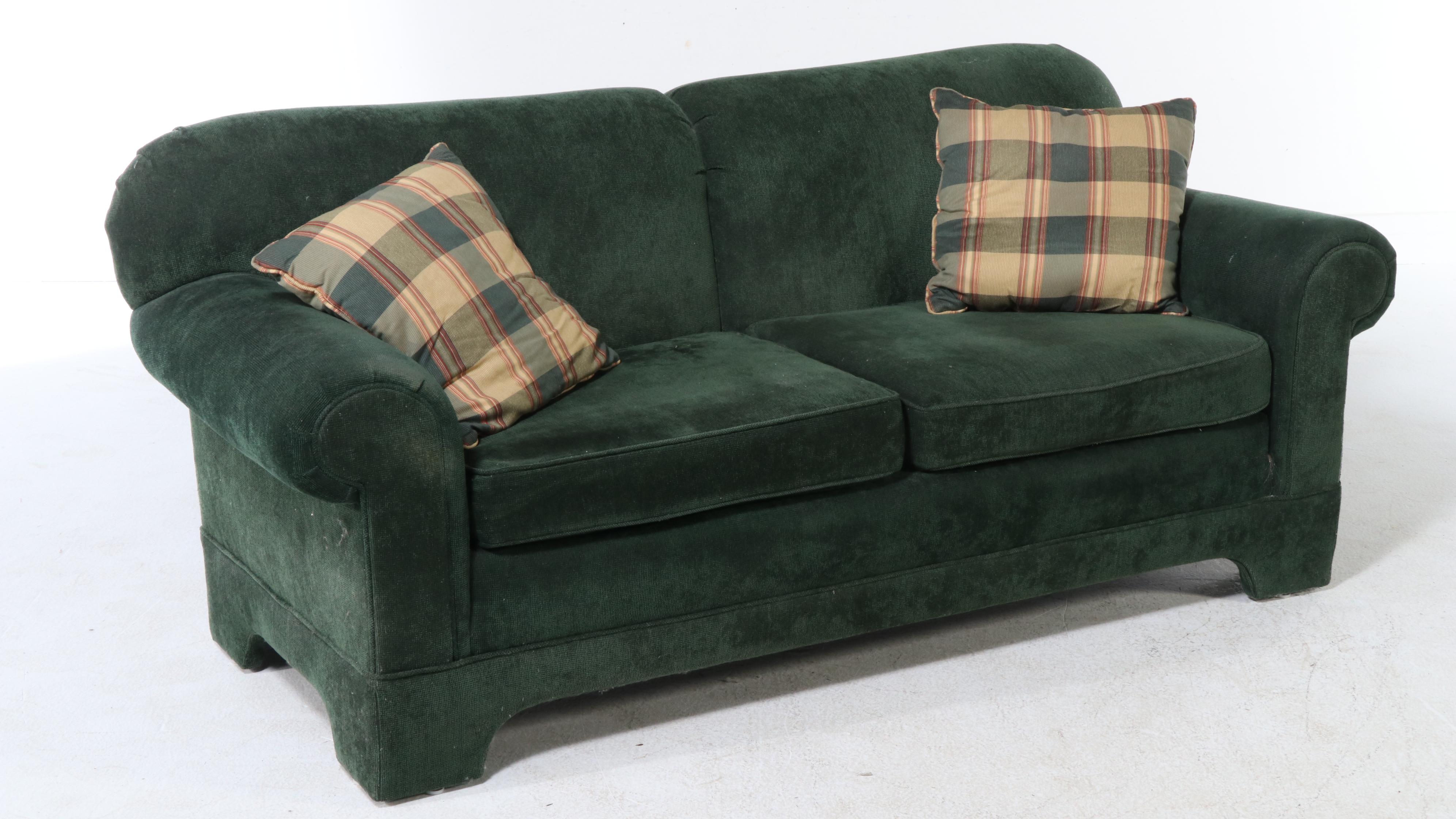 Pair of Emerald Green Upholstered Loveseats with Plaid Accent Pillows