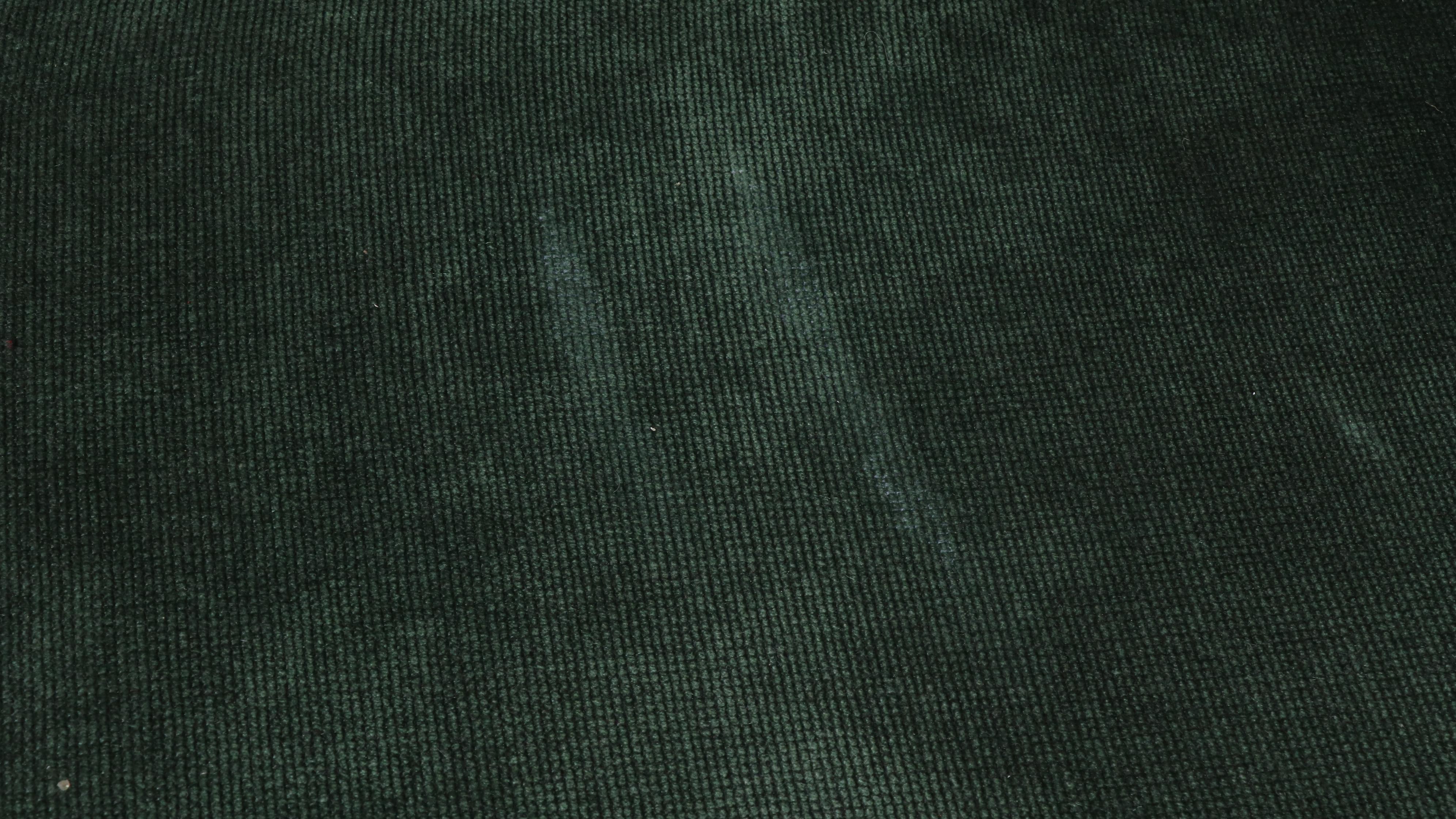 Pair of Emerald Green Upholstered Loveseats with Plaid Accent Pillows