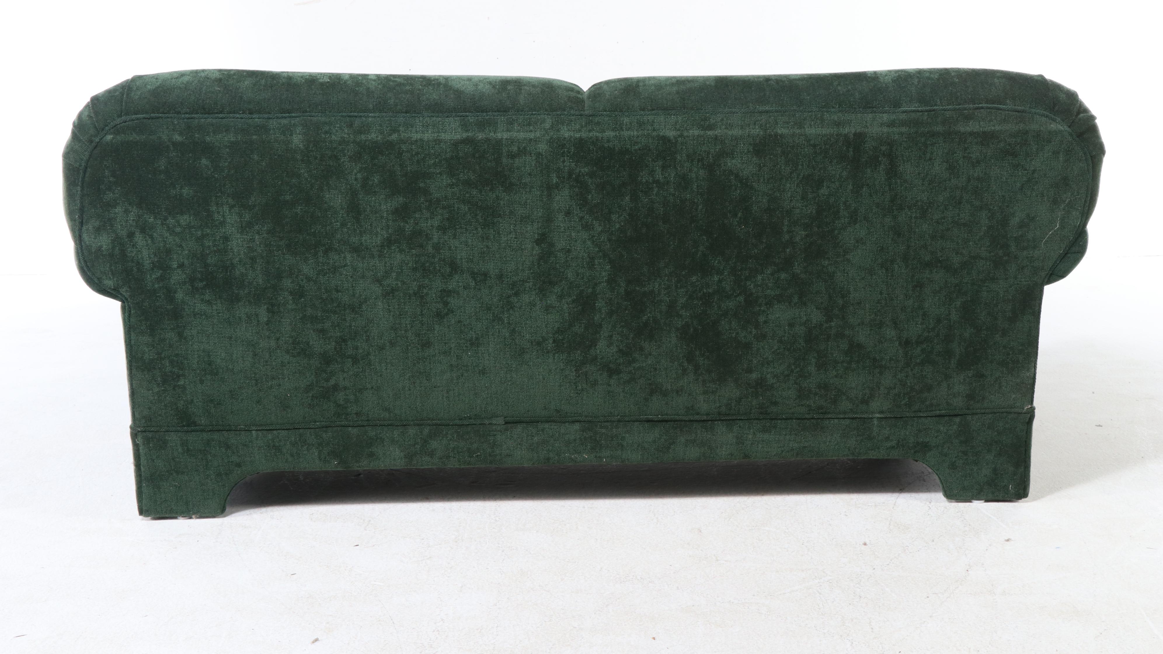 Pair of Emerald Green Upholstered Loveseats with Plaid Accent Pillows
