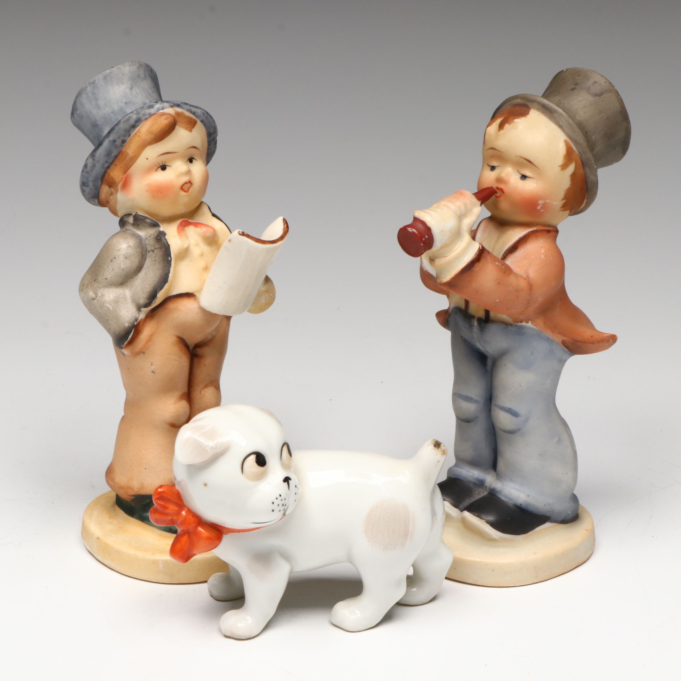 Porcelain Boy and Bulldog Figurines